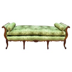 Early 20th Century French Carved Fruitwood Daybed in Green Silk