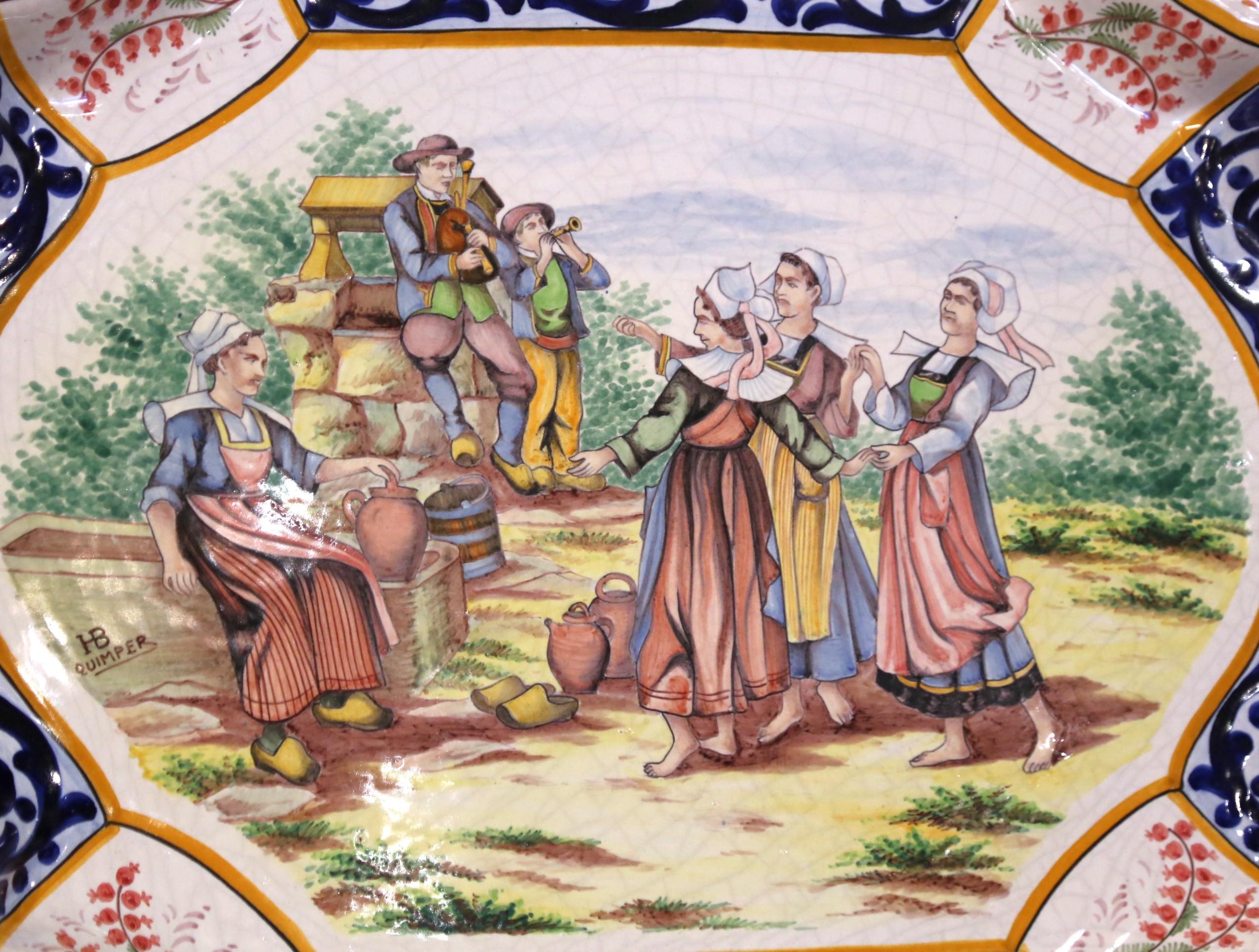 Hand-Painted Early 20th C. French HB Quimper Faience Platter with Breton Fountain Scene For Sale
