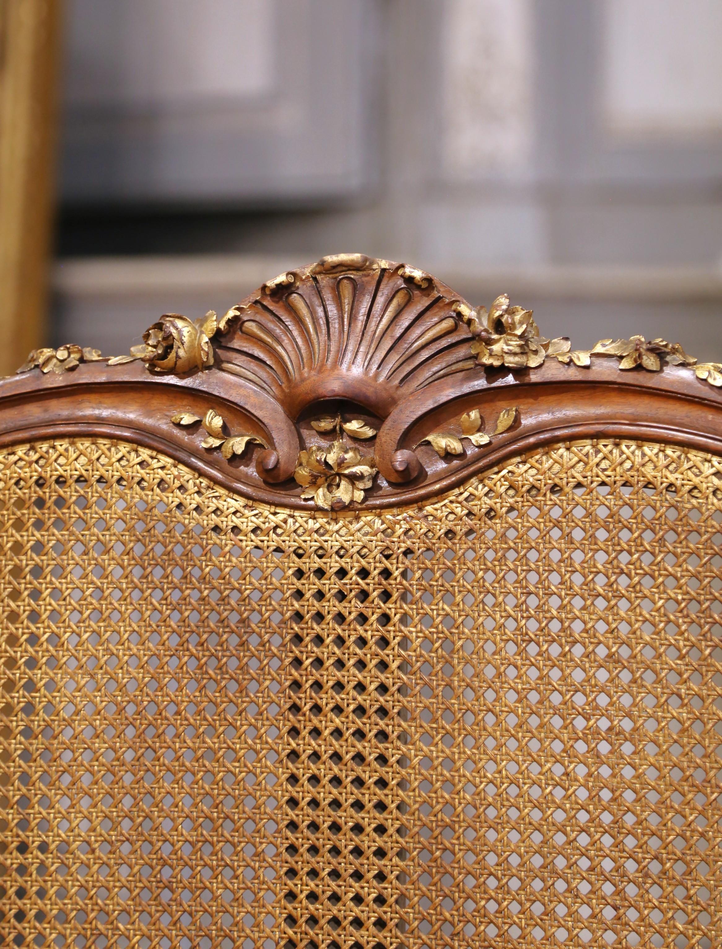 Early 20th C. French Louis XV Style Walnut and Cane Settee with Parcel Gilt In Excellent Condition For Sale In Dallas, TX