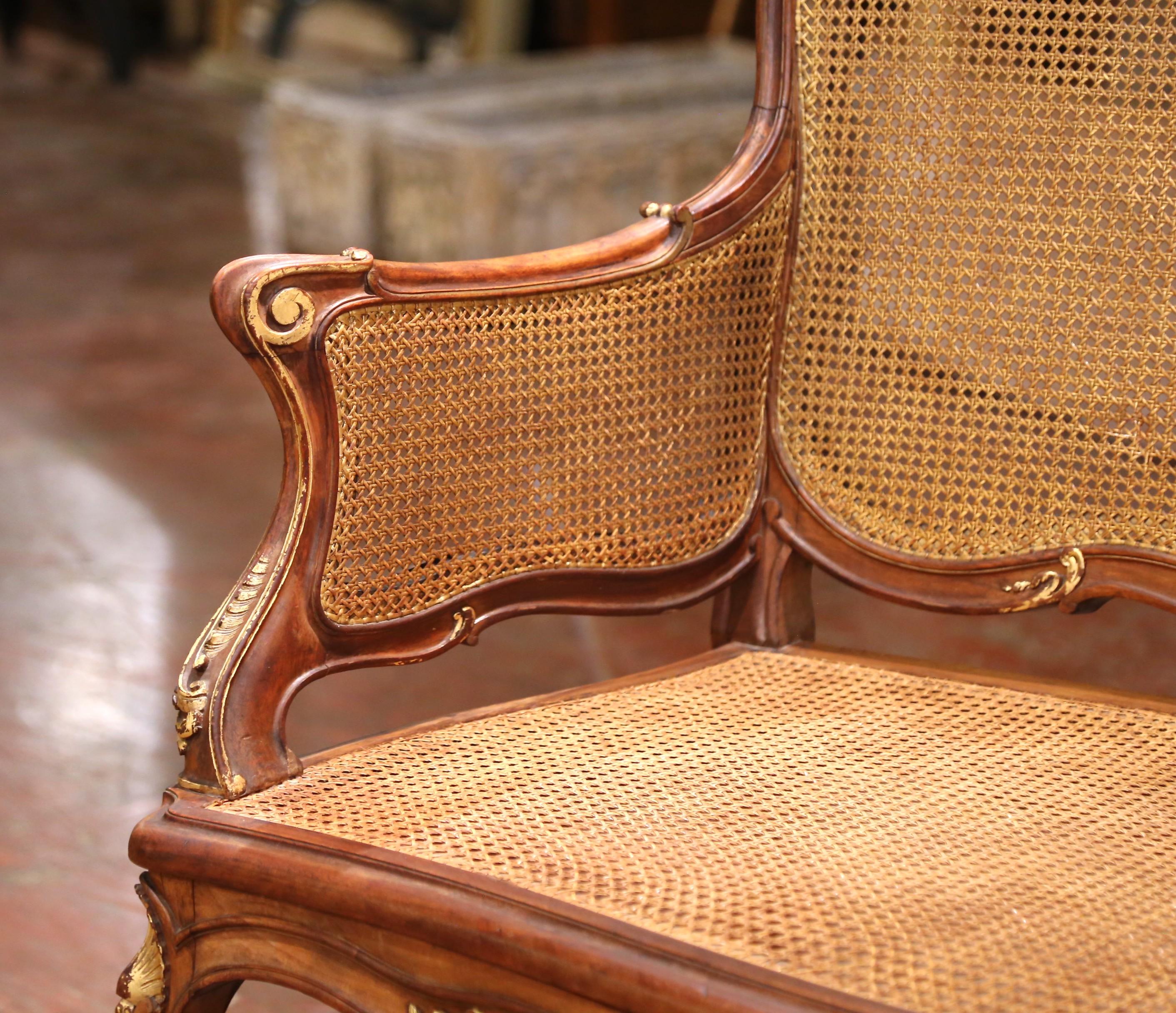 Early 20th C. French Louis XV Style Walnut and Cane Settee with Parcel Gilt For Sale 1