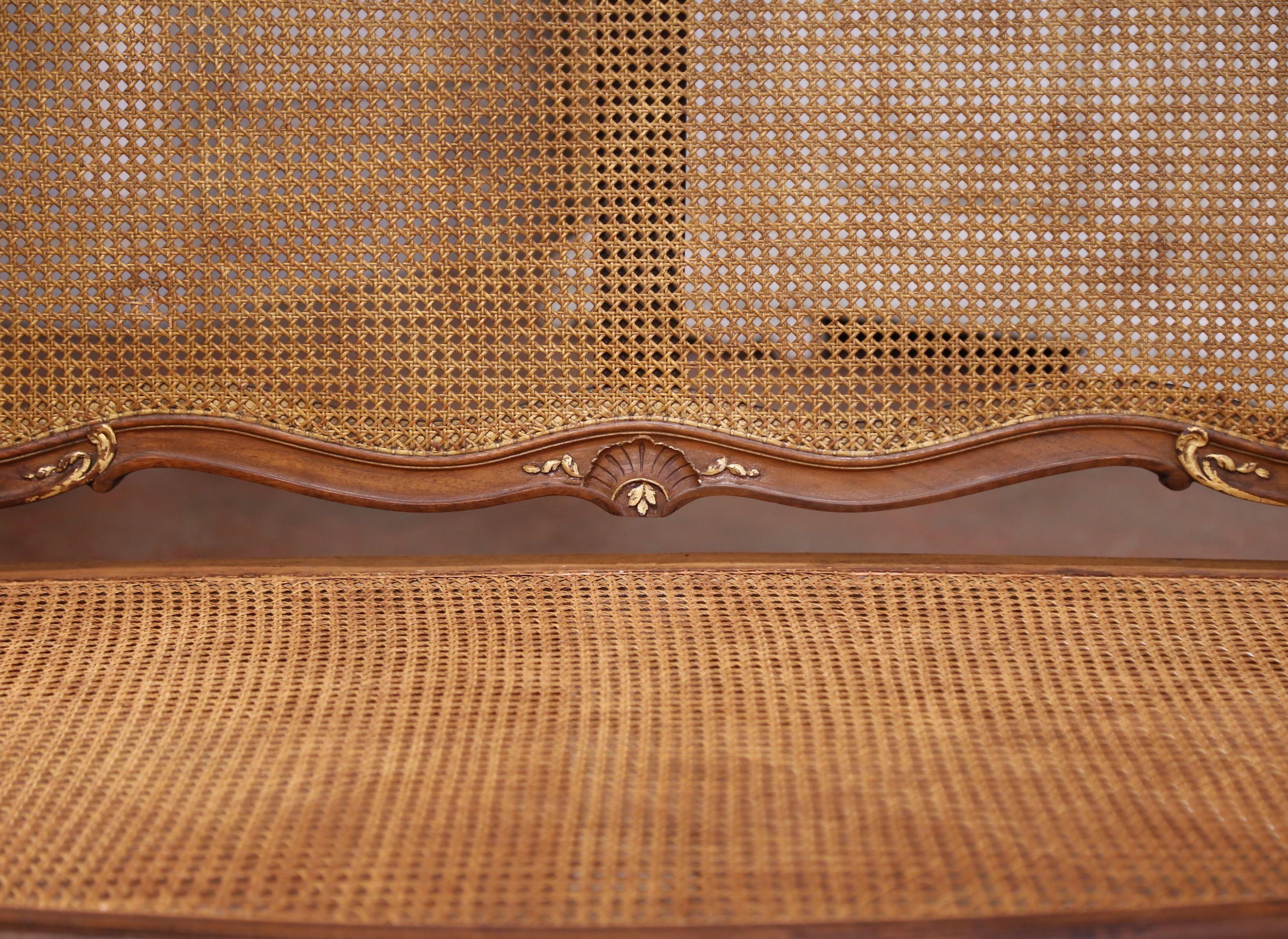 Early 20th C. French Louis XV Style Walnut and Cane Settee with Parcel Gilt For Sale 3