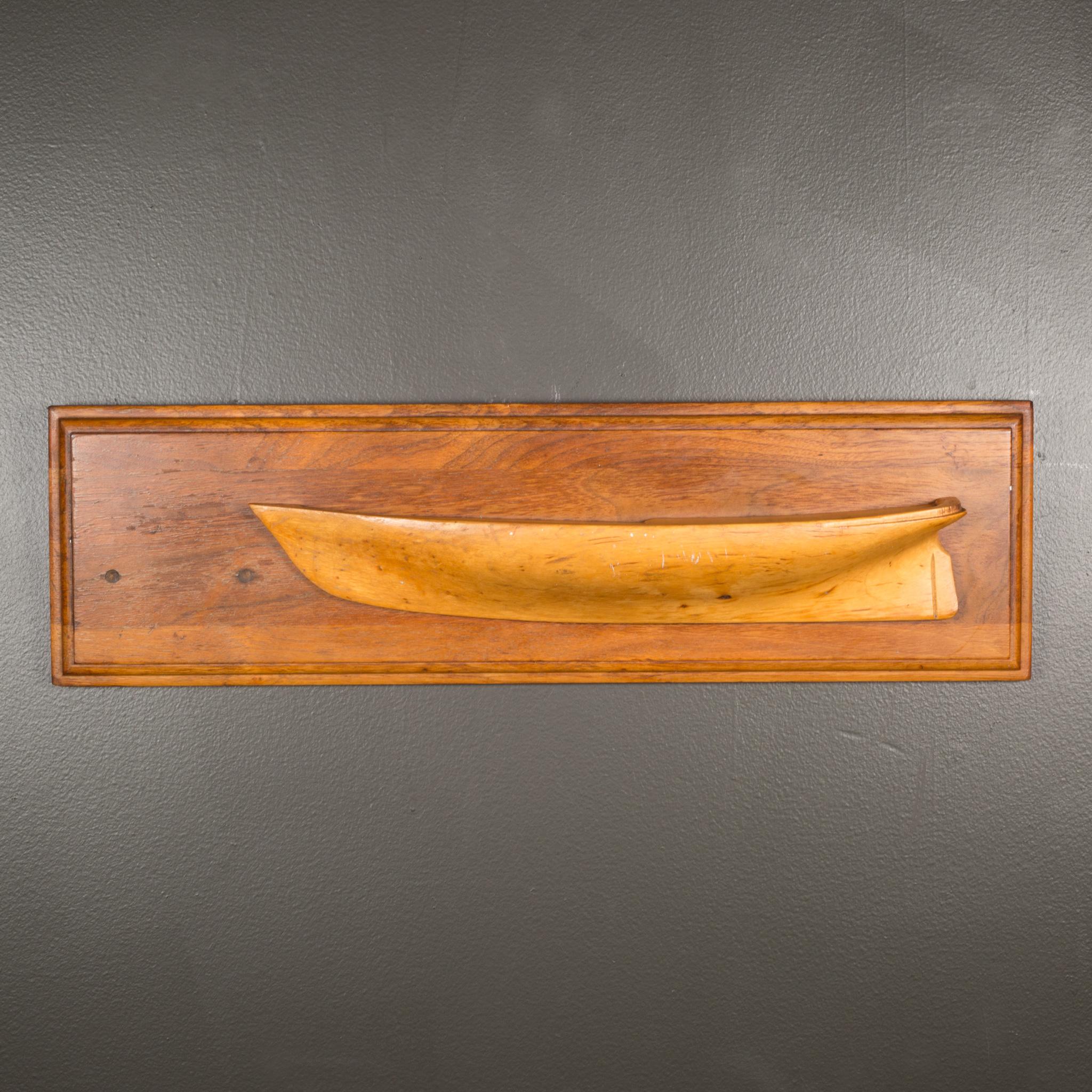 ABOUT

An original wooden half hull. Hand carved. This piece has retained its original finish and has the appropriate condition for the age. 

    CREATOR Unknown. 
    DATE OF MANUFACTURE c.1930-1940
    MATERIALS AND TECHNIQUES Wood.
    CONDITION
