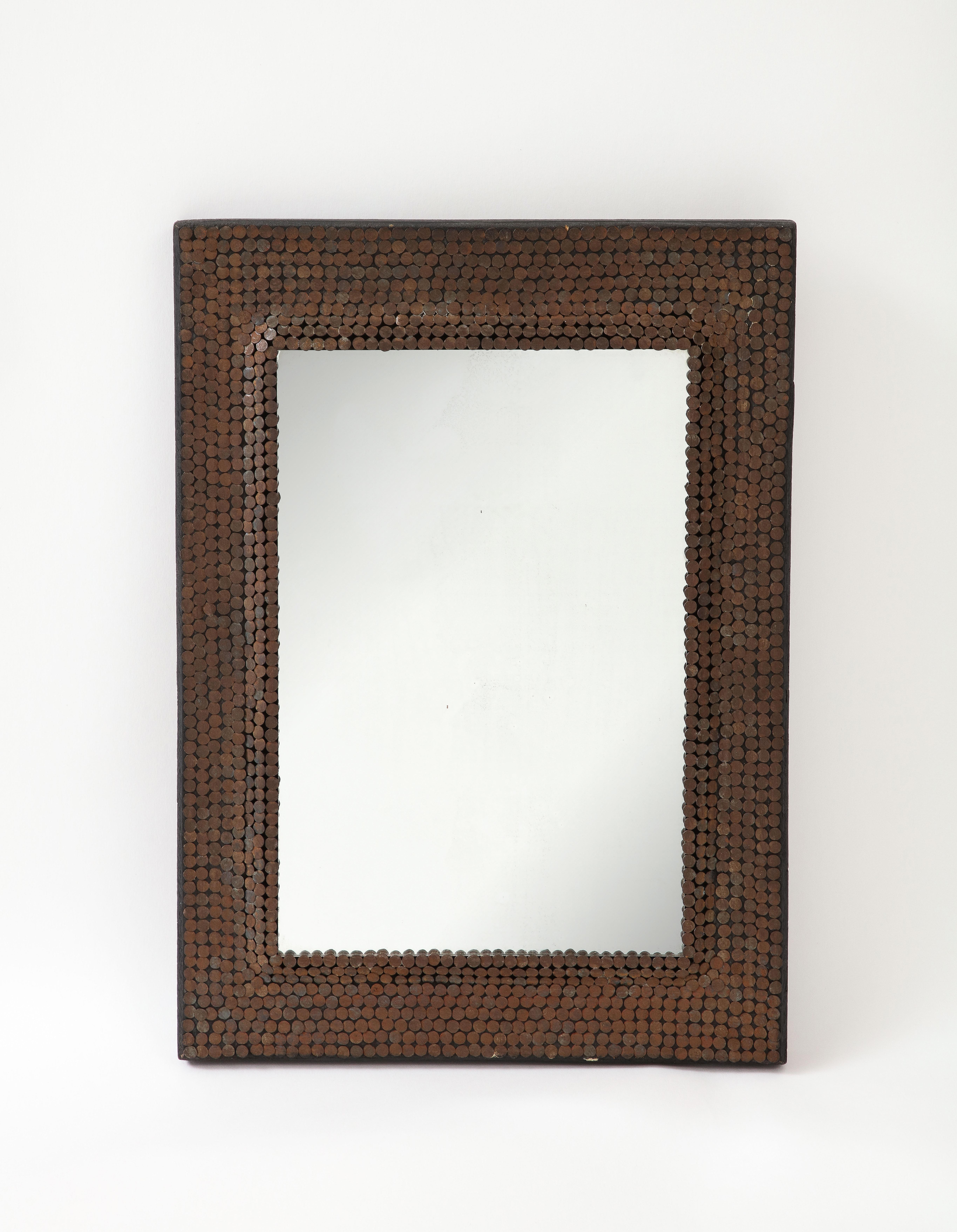 Early 20th C. Hand Made Mirror Studded with Nails, France
H: 16.5 W: 11.75 D: 1 in.

Hand Made of Nails