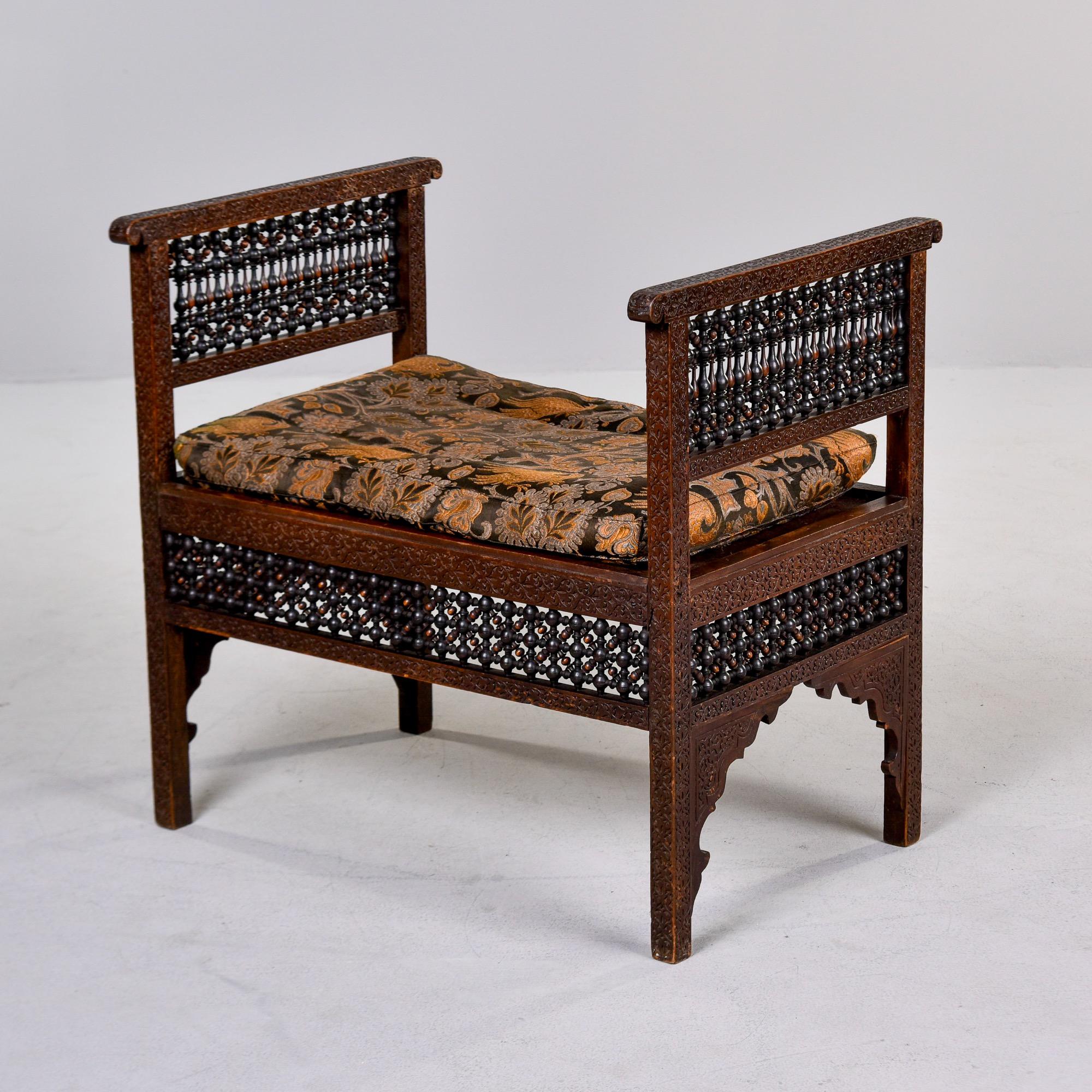 Early 20th C Heavily Carved Teak Moorish Bench With Tall Sides and Cushion In Good Condition For Sale In Troy, MI