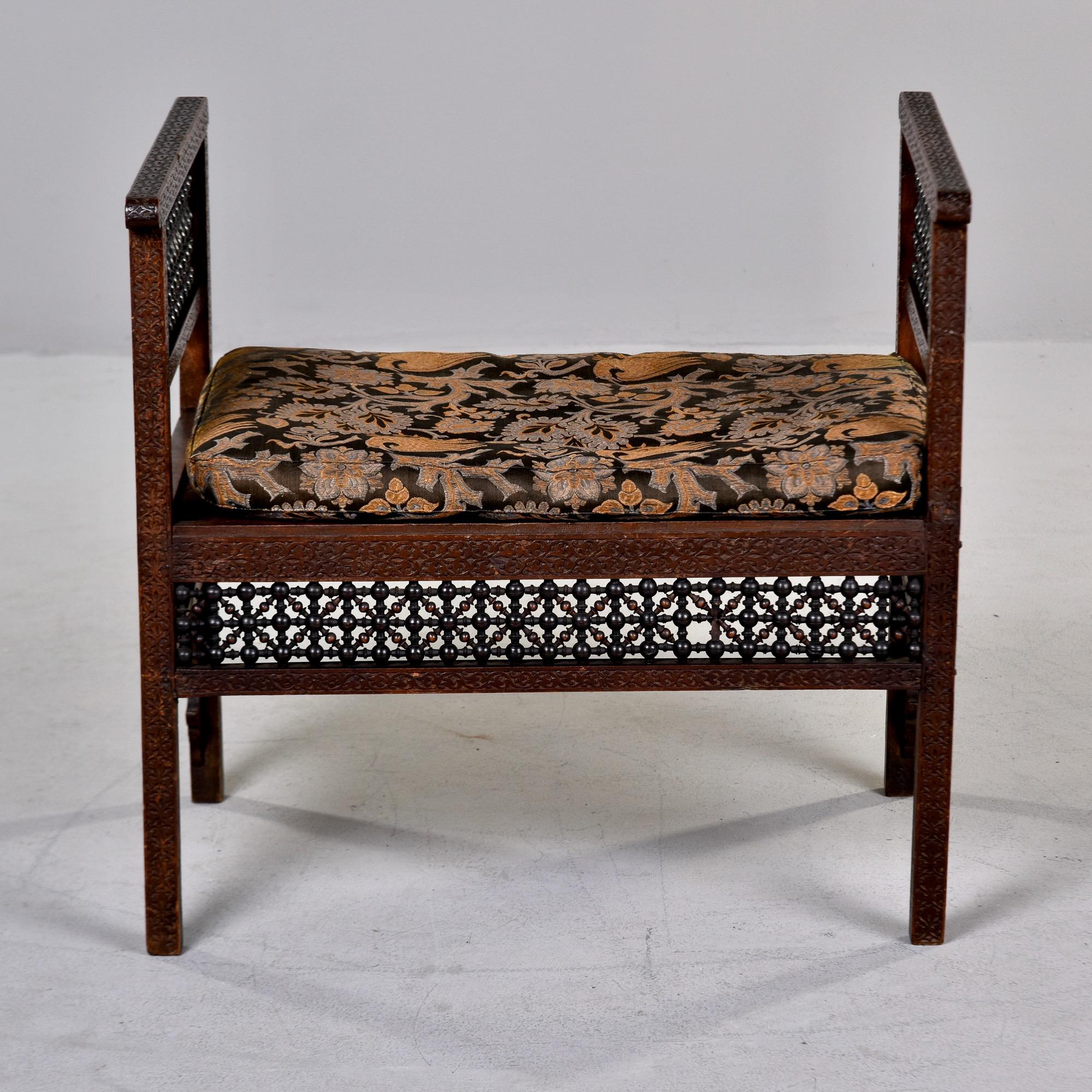 Upholstery Early 20th C Heavily Carved Teak Moorish Bench With Tall Sides and Cushion For Sale