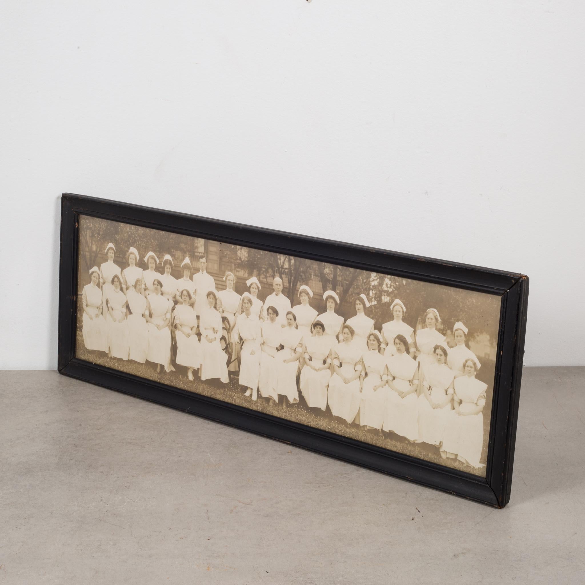 ABOUT

An original panoramic photo of a group of mostly nurses and two doctors. The photo is black and white and framed in the original wooden frame. The picture has faded somewhat. The frame is in good condition with minor wear and the appropriate