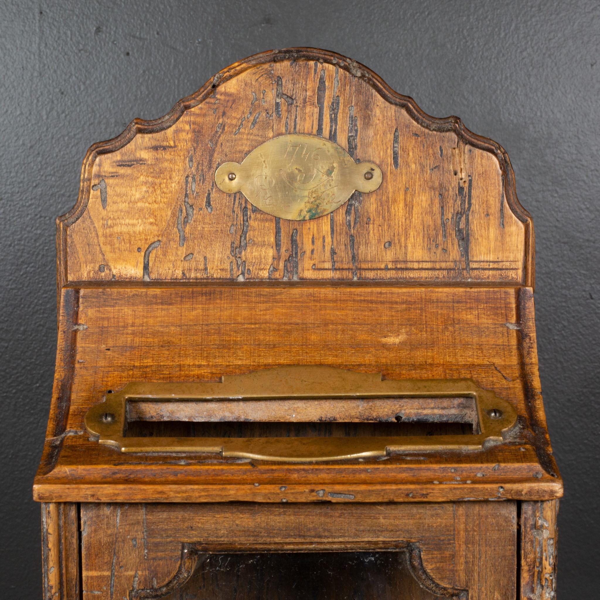 ABOUT

Italian wood and glass front mailbox with engraved brass plaque, brass mail slot and brass key hole. Stamped 