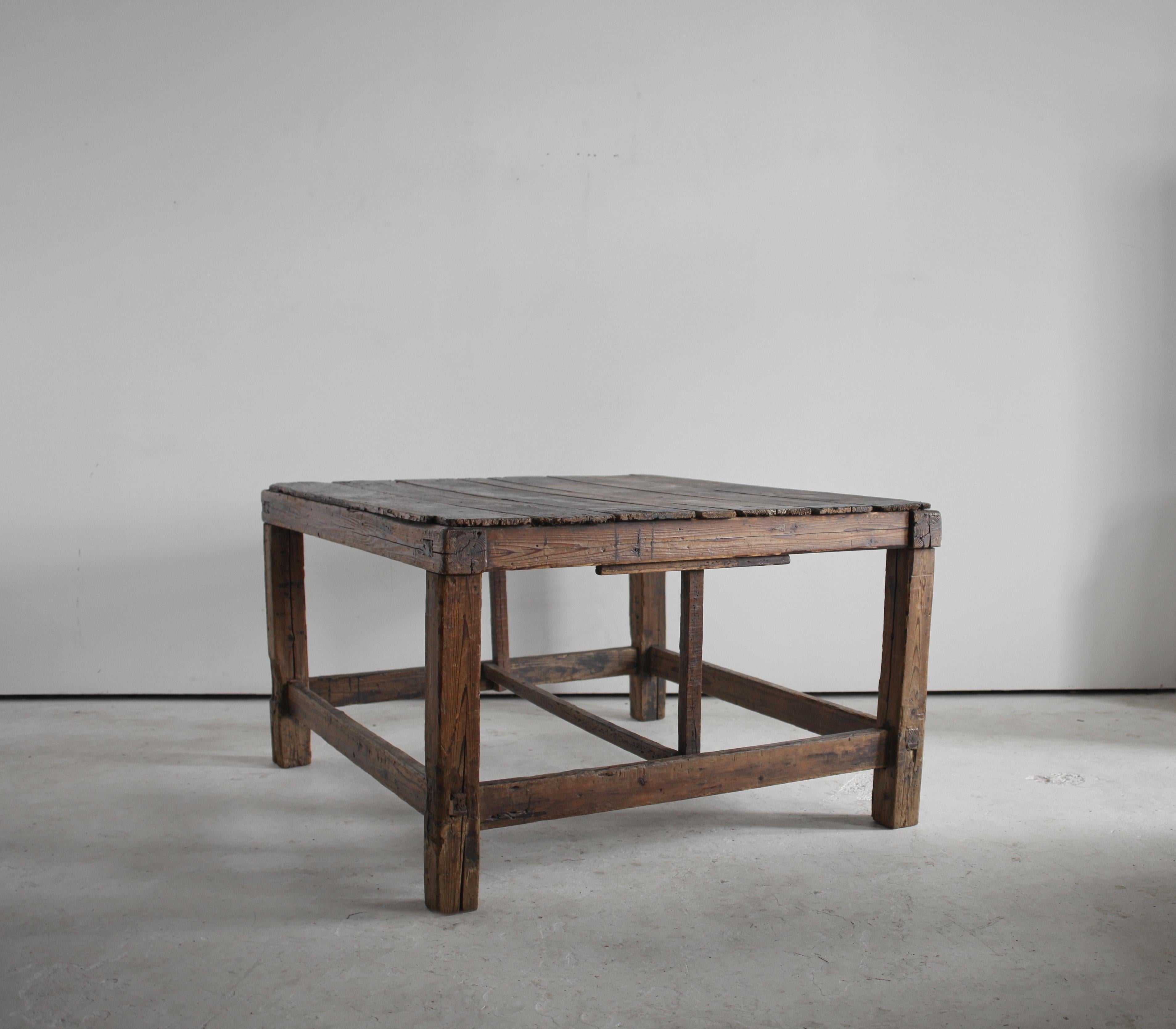 A rare, heavily patinated cedar table from an artist studio on the outskirts of Tokyo.

 
Solidly constructed with many age old repairs.

 
Sympathetically restored in our London workshop.