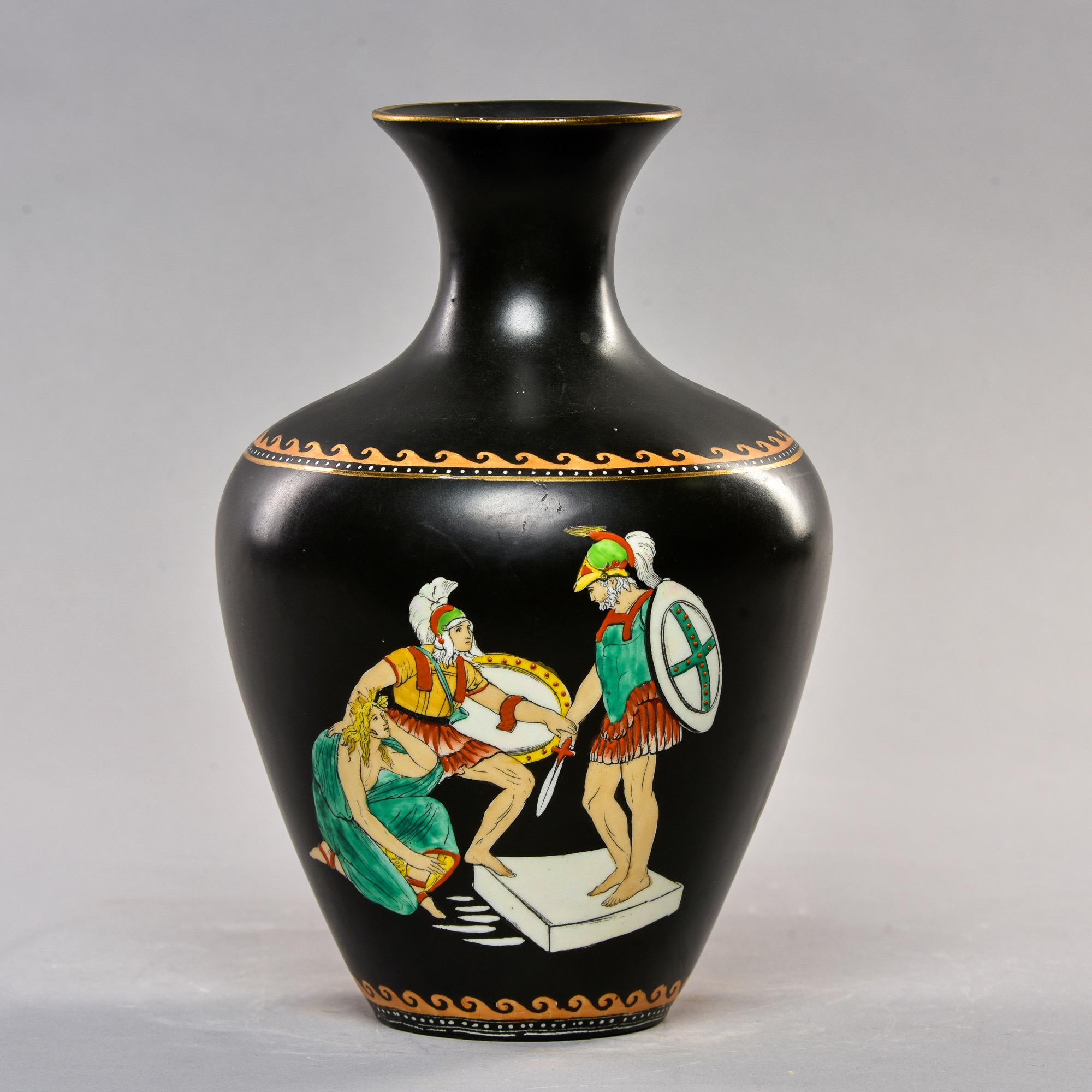 Rare circa 1920s English vase by John Tams Ltd depicting scene from Odyssey of Telemachus interceding for Phemius. Black matte glaze with colorful decoration of the three figures. Gold rim, and borders at shoulders and base.