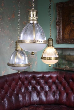 Early 20th Century Large Caged Brass Glass Holophane Lanterns Three Available