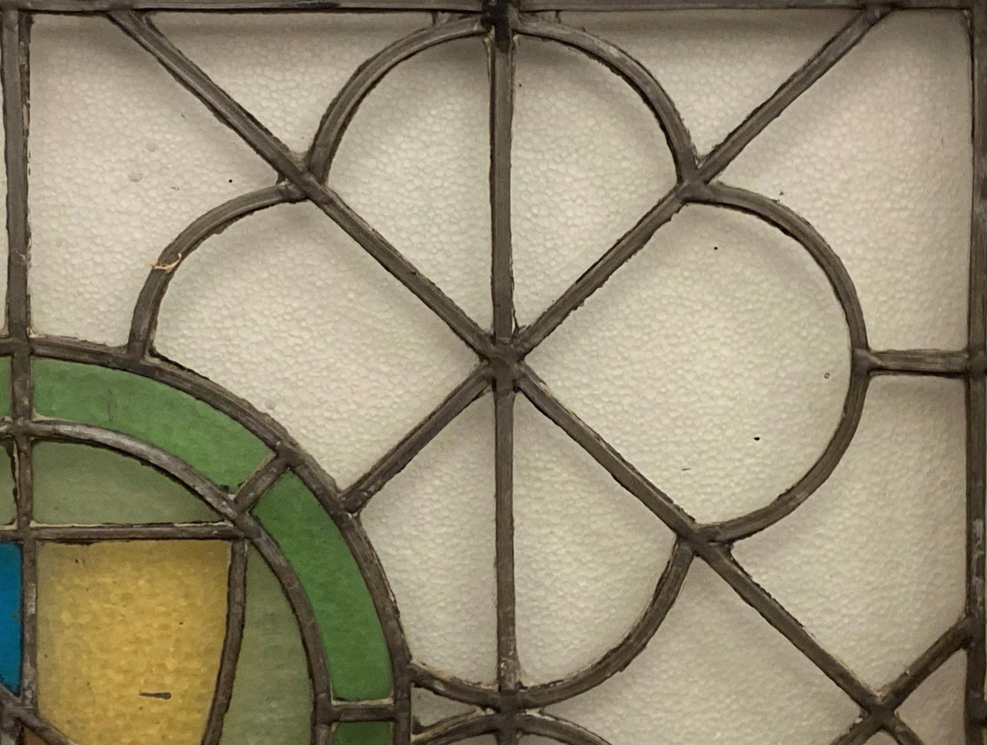 American Early 20th C. Leaded Stained Glass Window with a Quatrefoil and Shield Motif