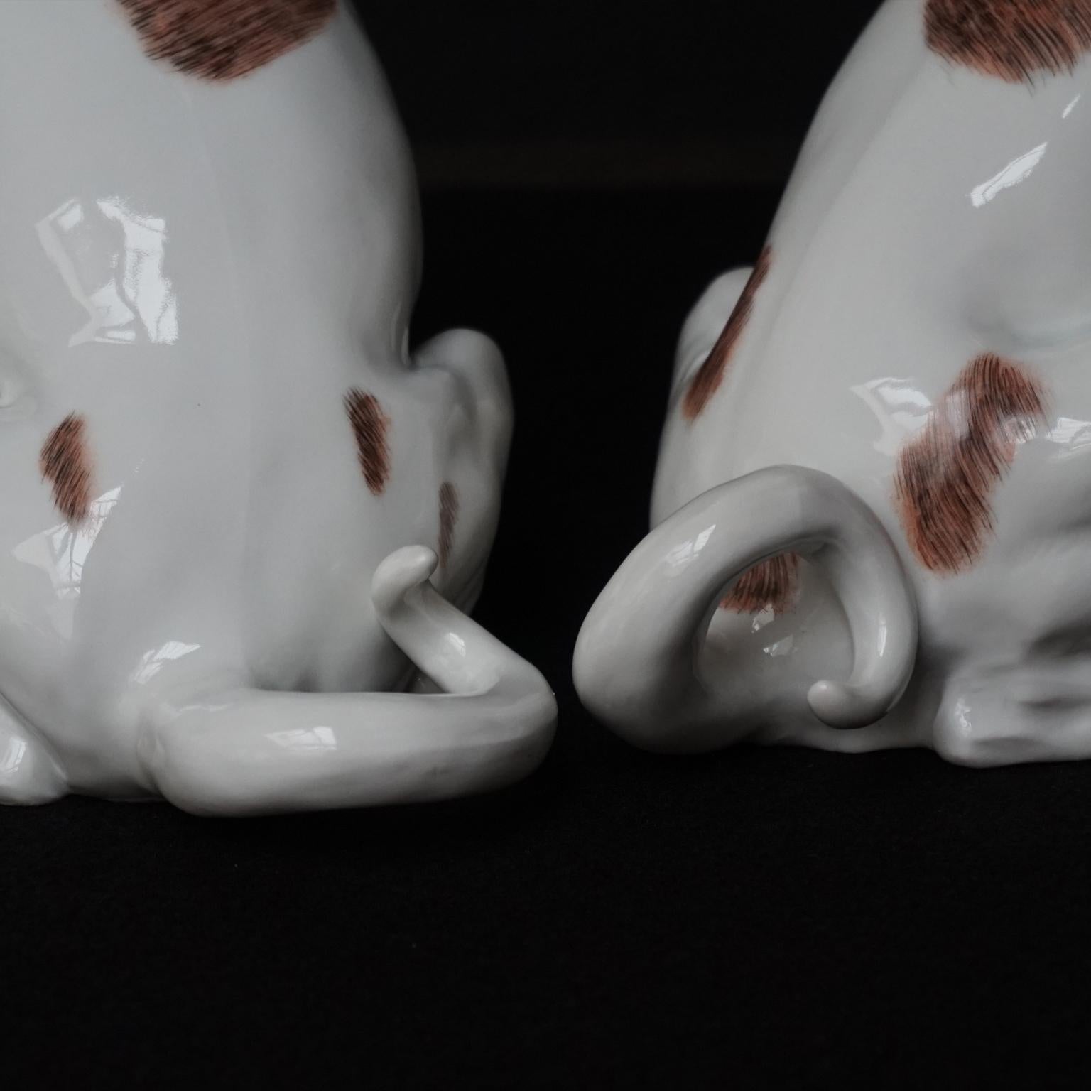 20th Century Male and Female Pair of Dresden Saxon Porcelain Pug Dog Figurines