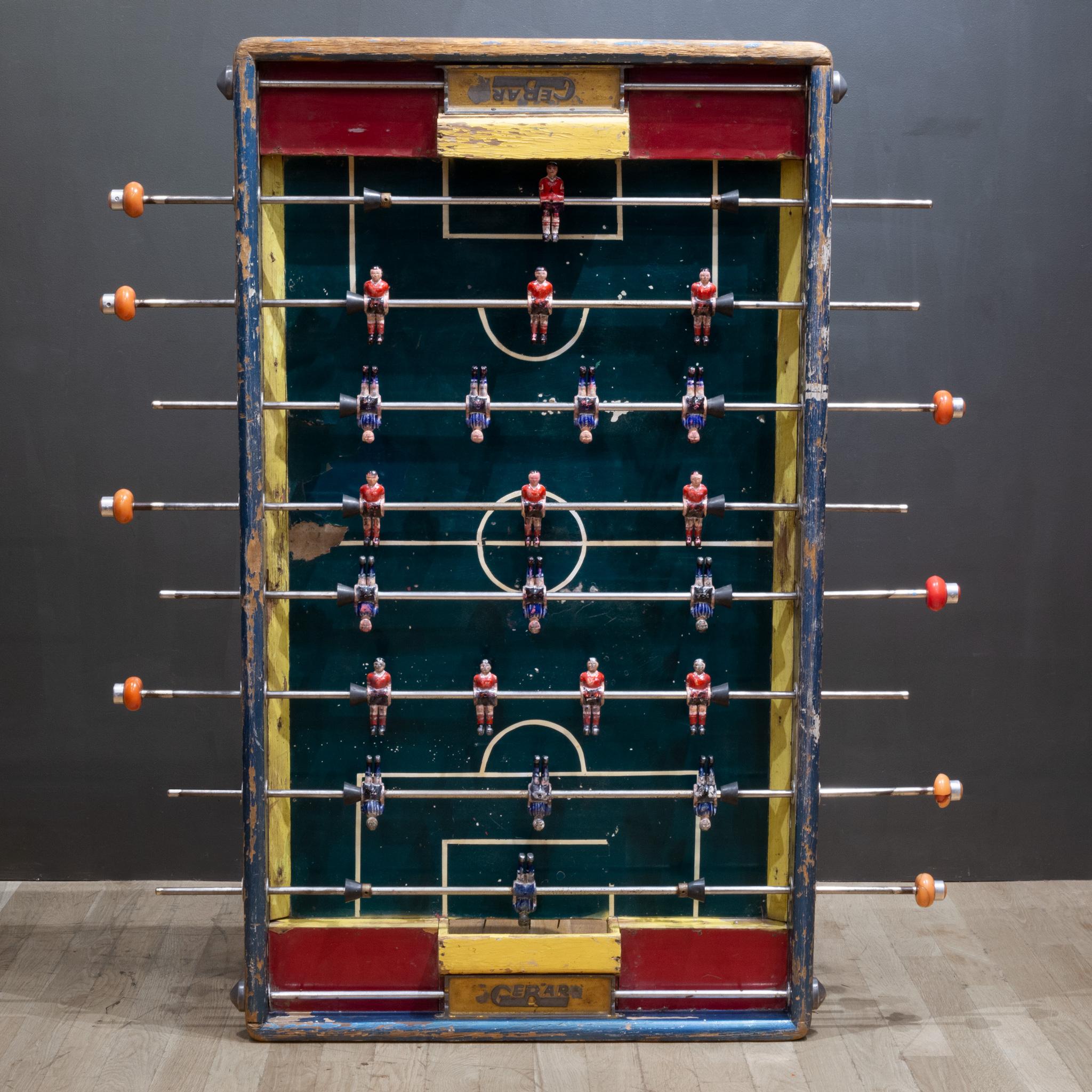 About

Contact us for more shipping options: S16 Home San Francisco.

An early 20th century wooden foosball table top with distressed, painted metal Mexican soccer players, rubber handles and metal 