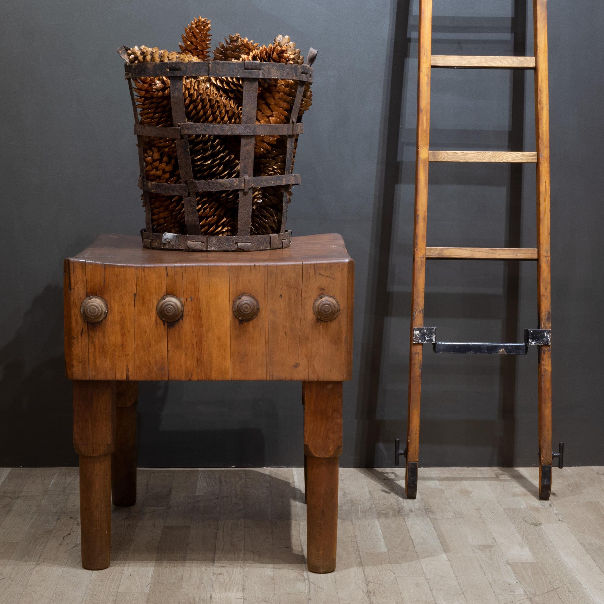 ABOUT
An antique Michigan Maple Block Co. solid butcher's block with 12.75 inch thick top, manufacture's stamp, four rods that run through the block and original eight metal caps, beautiful turned legs and a food safe waxed and beautifully worn