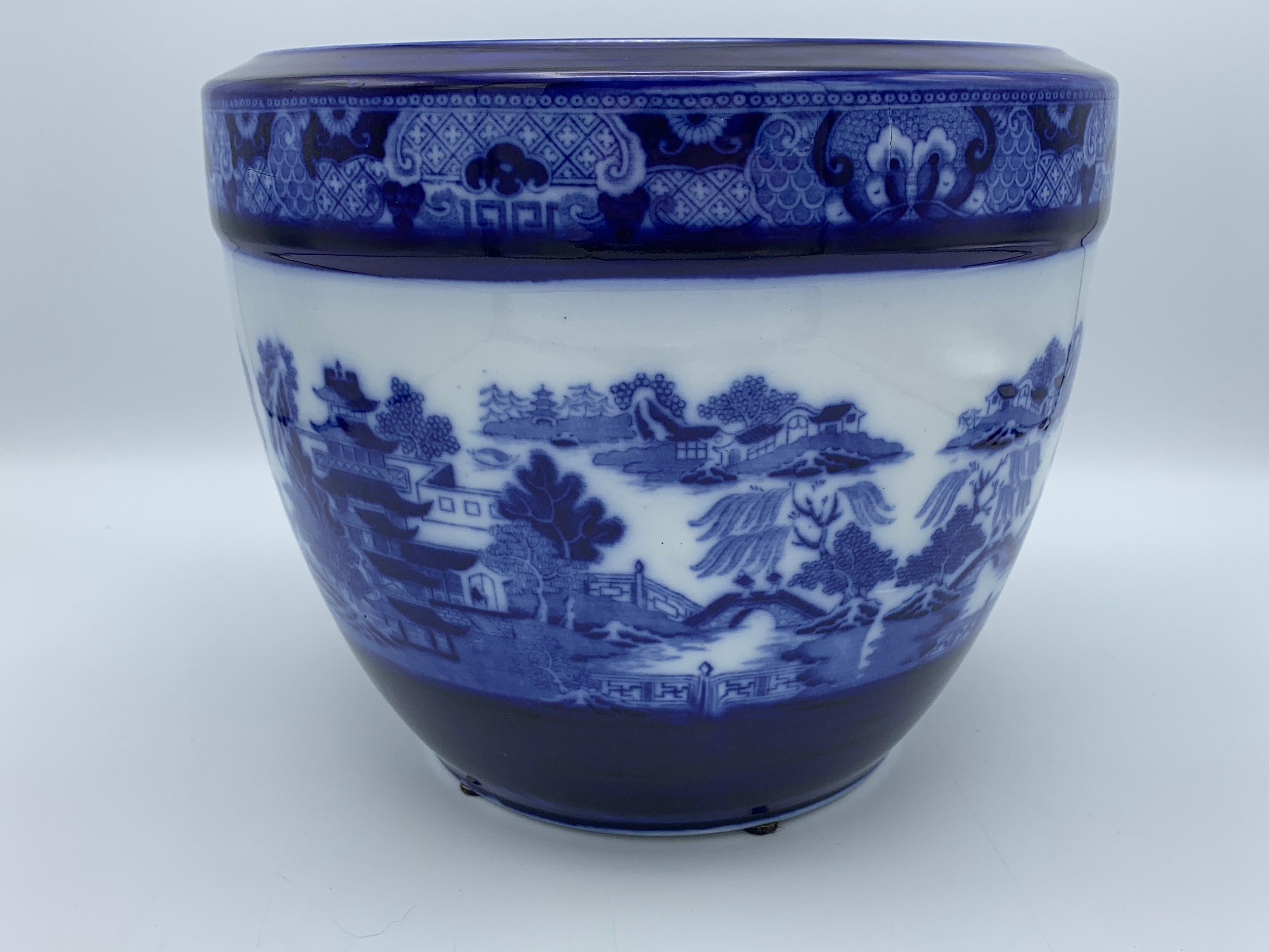 Offered is an exquisite and extremely rare, large early 20th century Minton Co. cachepot, circa 1910s-1920s. This stunning European pottery is truly a masterpiece and very difficult to acquire, especially in this large size (8in H x 9.75in W). The