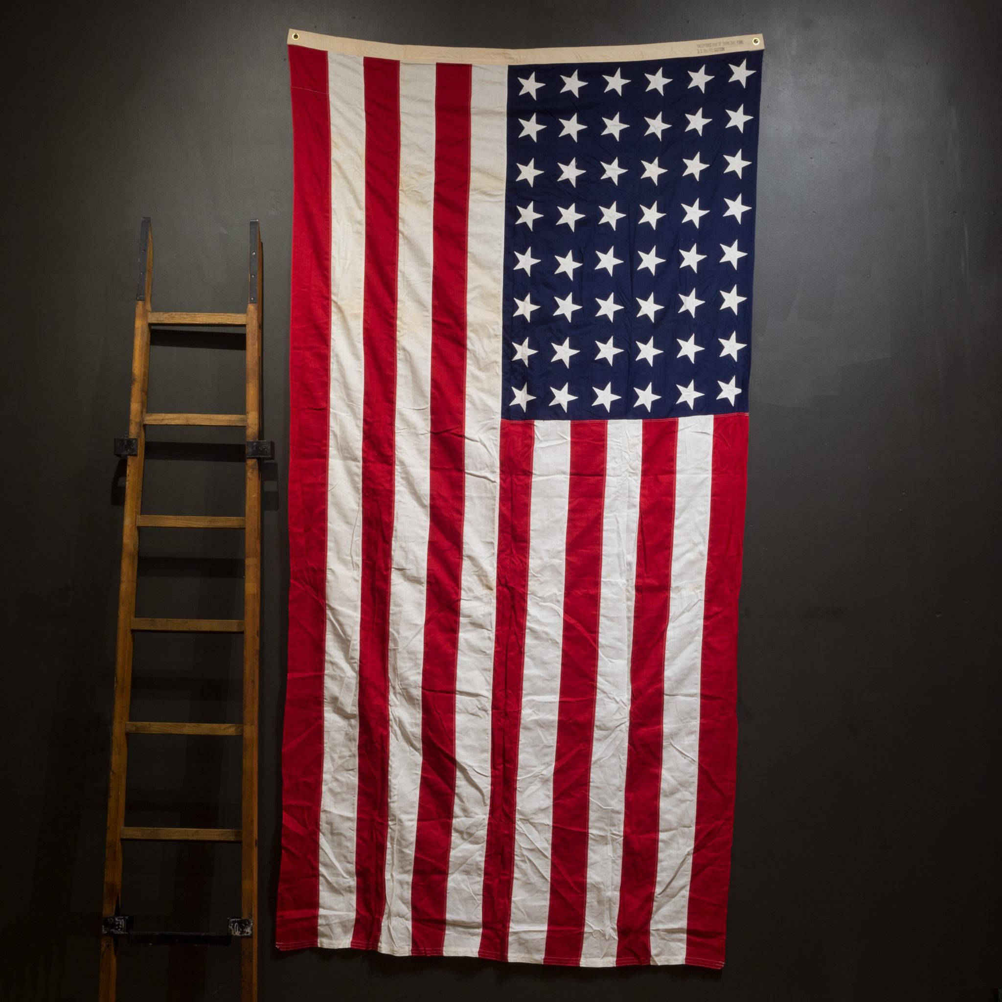 About

This is an original monumental American flag made by Valley Forge Co. with 48 stars and stripes and brass grommets.

Creator Valley Forge Co.
Date of manufacture c.1940-1950.
Materials and techniques cotton, metal.
Condition good. Wear
