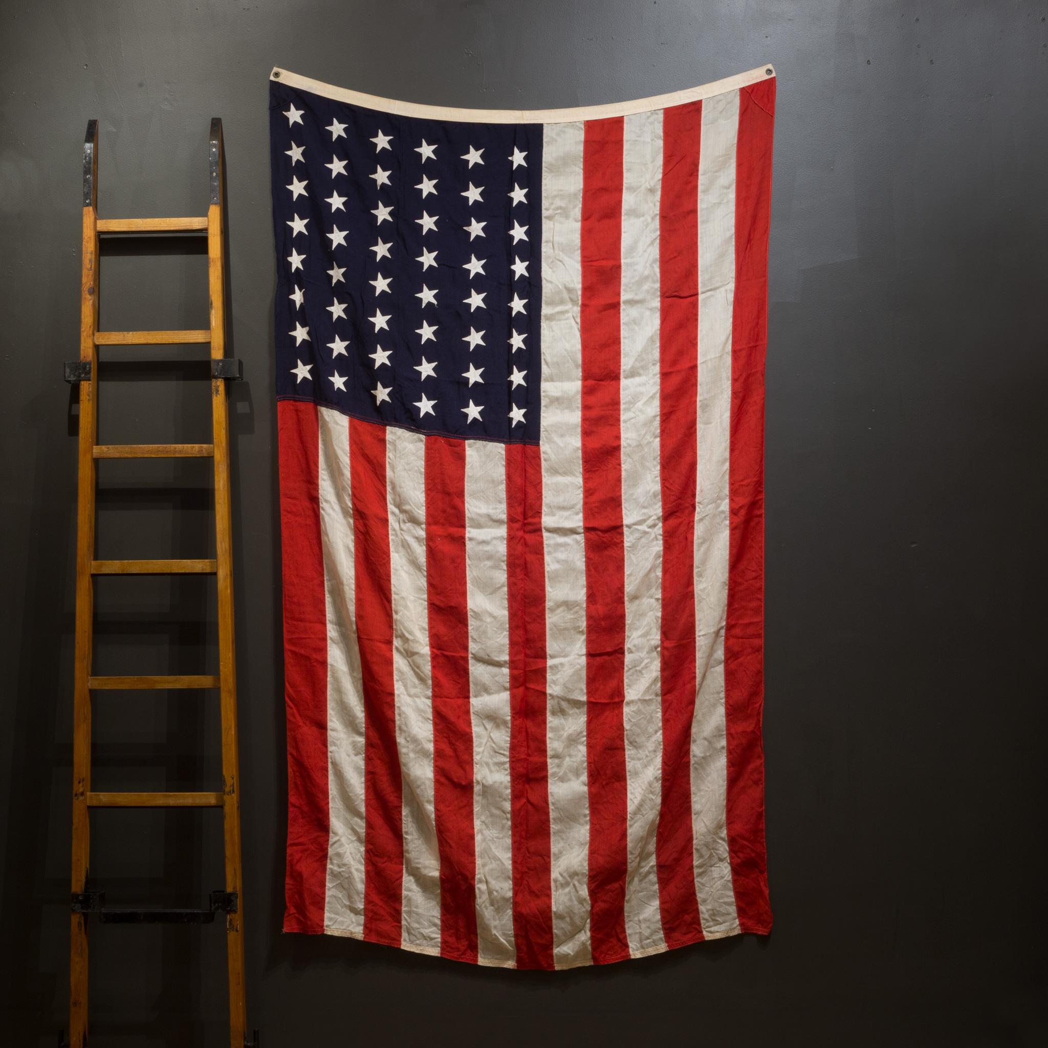 ABOUT

This is an original wool monumental American flag with 48 hand sewn stars and metal grommets to hang it.

 CREATOR Sterling Bunting.
 DATE OF MANUFACTURE c.1940-1950.
 MATERIALS AND TECHNIQUES Wool, Metal.
 CONDITION Good. Wear