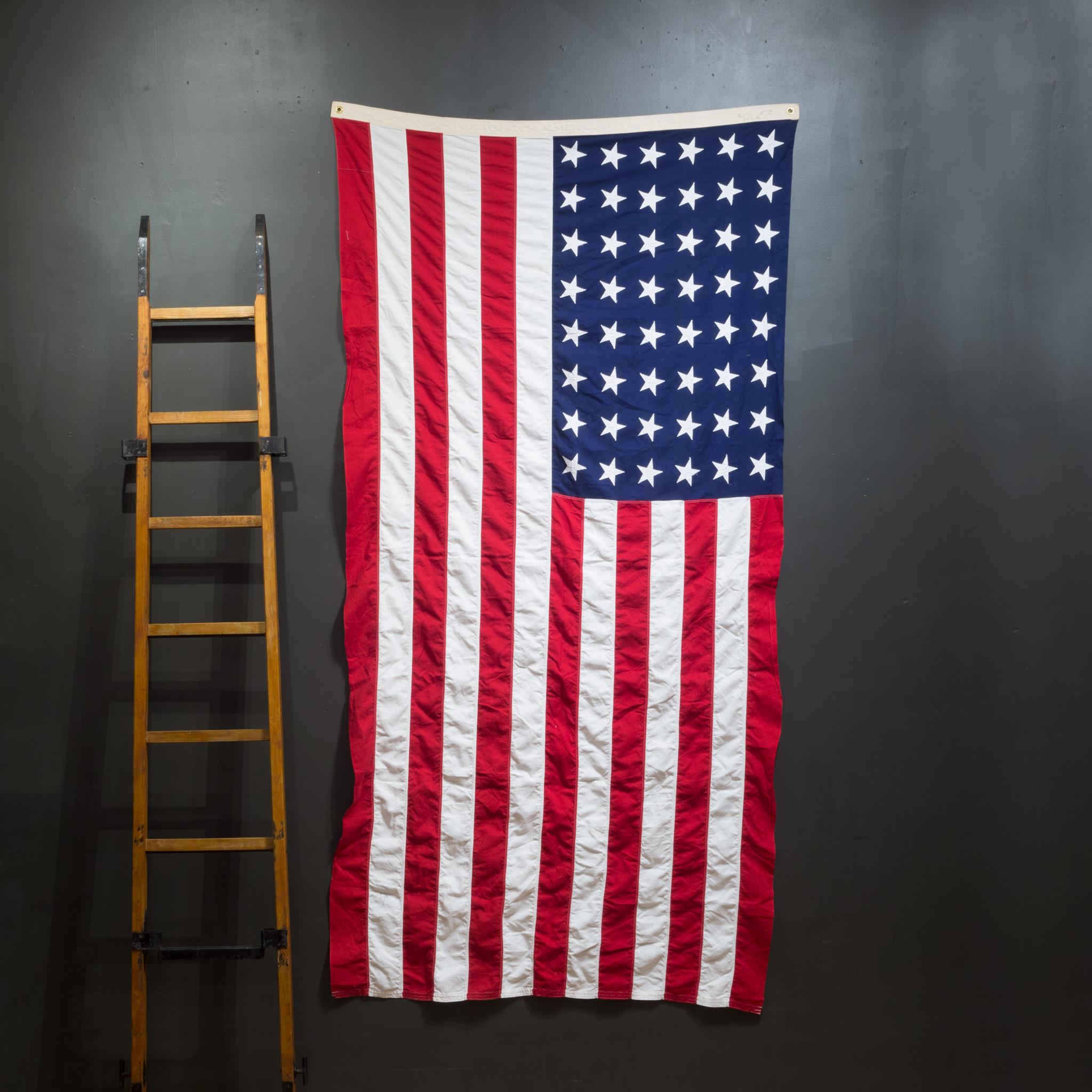ABOUT

This is an original monumental American flag made by Valley Forge Co. with 48 hand sewn stars and stripes. It is in good condition and has metal grommets to hang.

 CREATOR Valley Forge Co.
 DATE OF MANUFACTURE c.1940-1950.
 MATERIALS