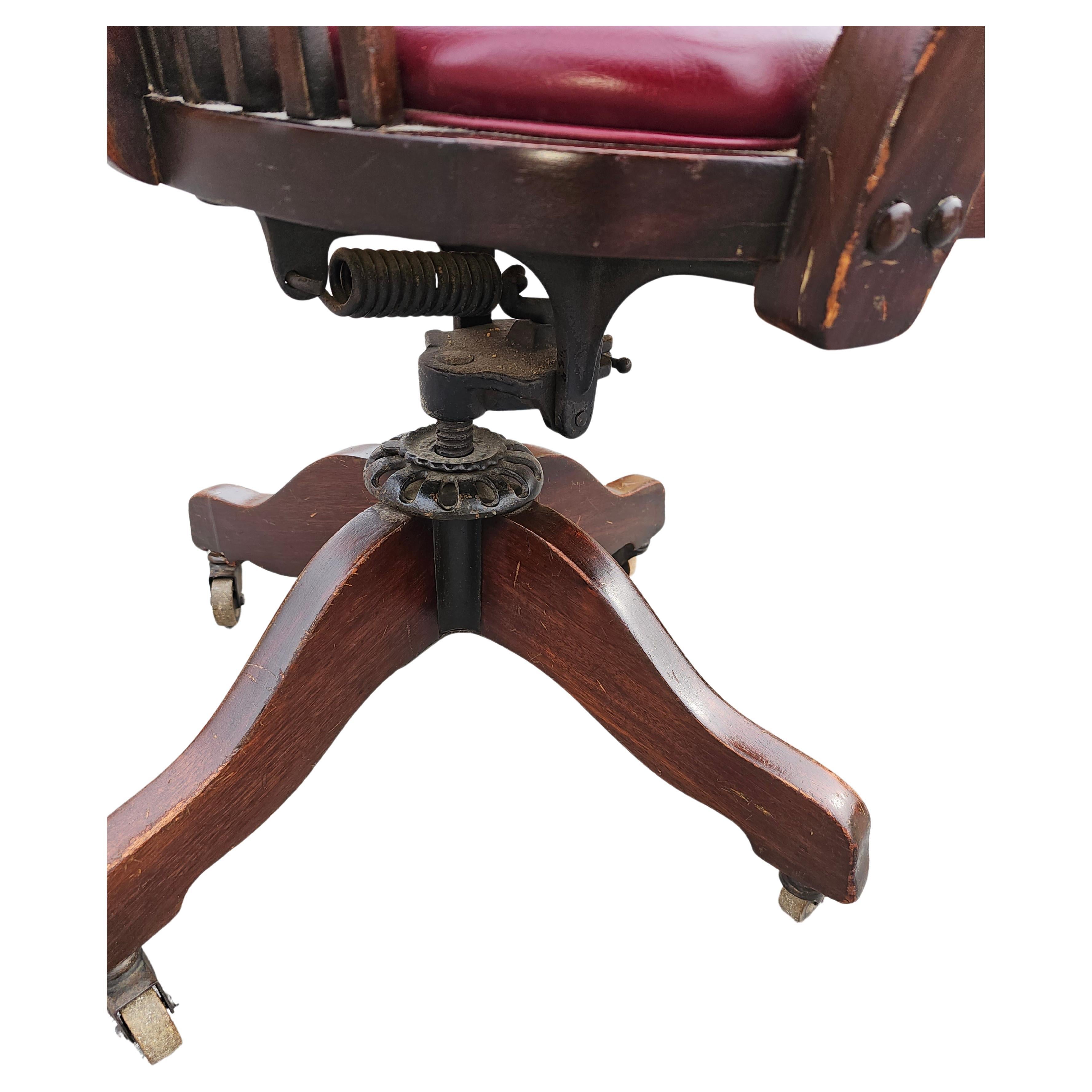 Early 20th C. Oak and Vinyl Upholstered Seat Rolling & Swivelling Banker's Chair For Sale 2