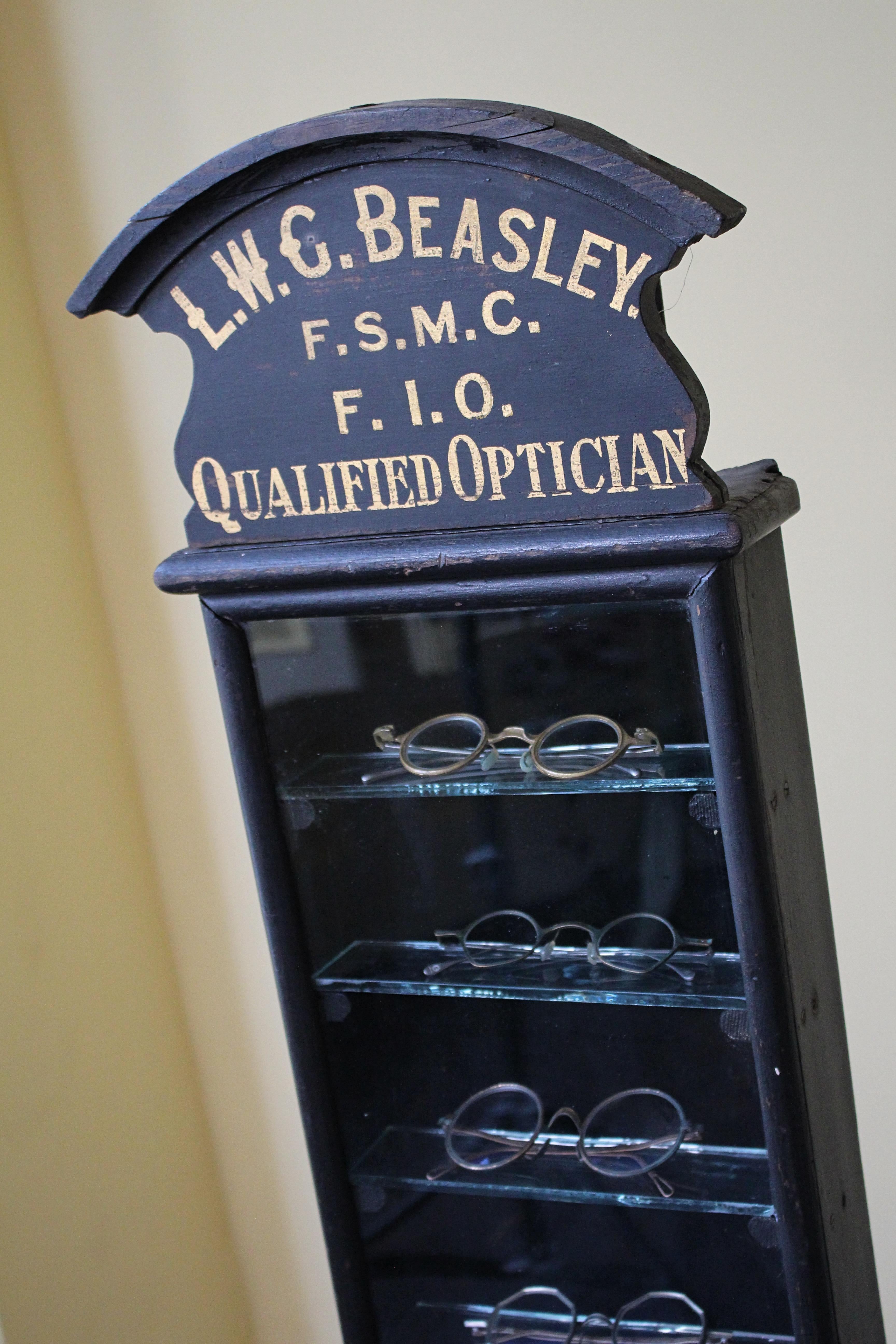 20th Century Early 20th C Opticians Spectacles Display Shop Cabinet Ebonised Gilt Vitrine  For Sale