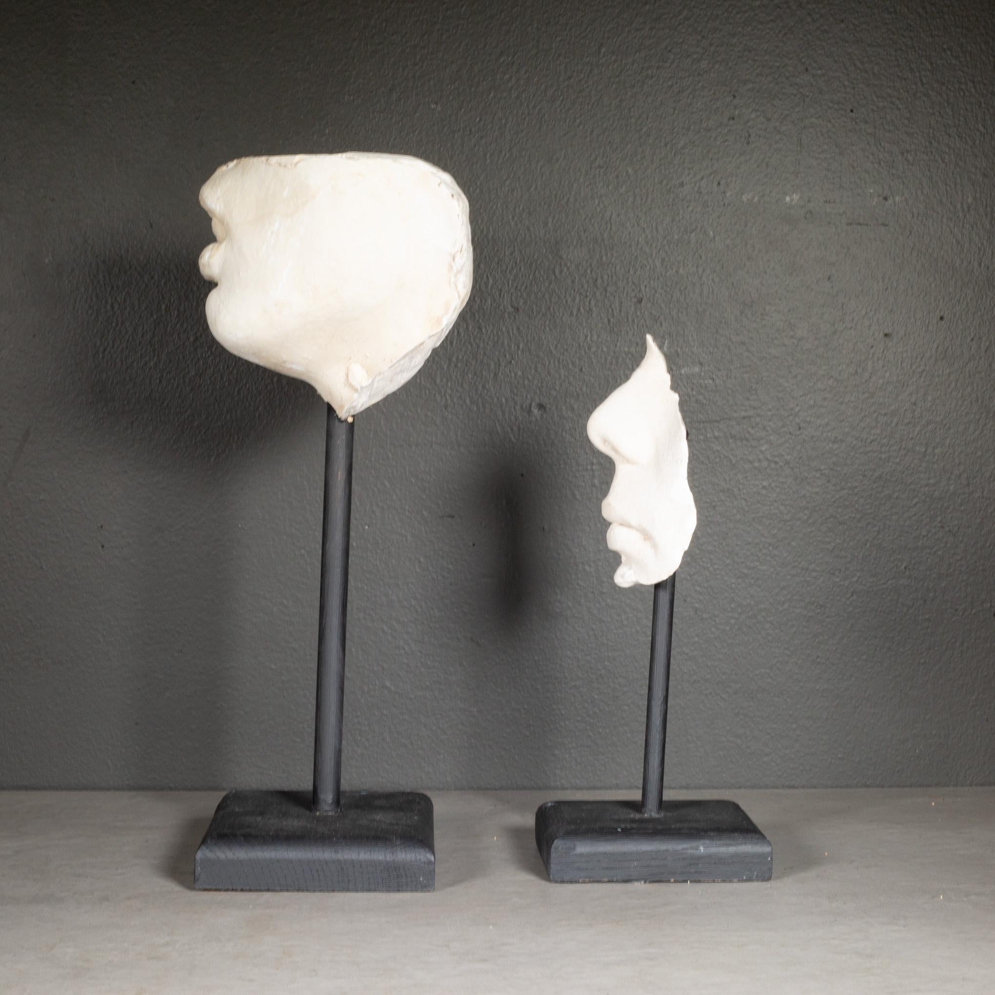 ABOUT

Plaster cast nose and mouth sculptures mounted on black, wooden stands. 

Shown with life size hand model for scale. 

    CREATOR Unknown. 
    DATE OF MANUFACTURE c.1900-1930. 
    MATERIALS AND TECHNIQUES Plaster. Wood. 
    CONDITION
