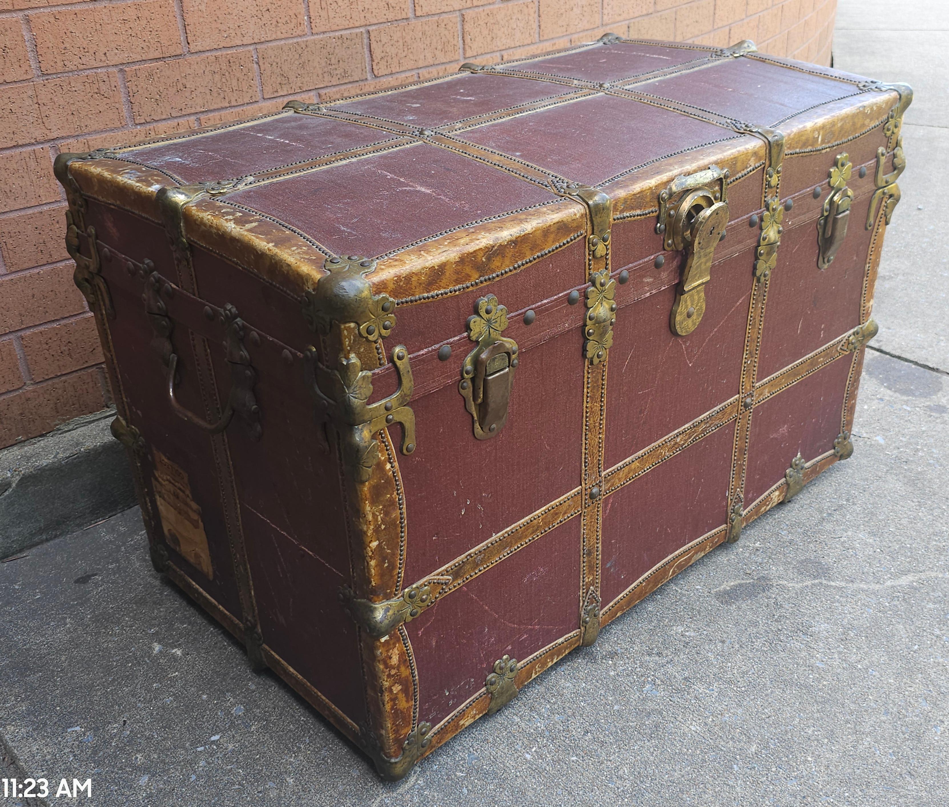 British Colonial Early 20th C. Rawleys Brass and Leather Bound On Canvas Wardrobe Trunk For Sale