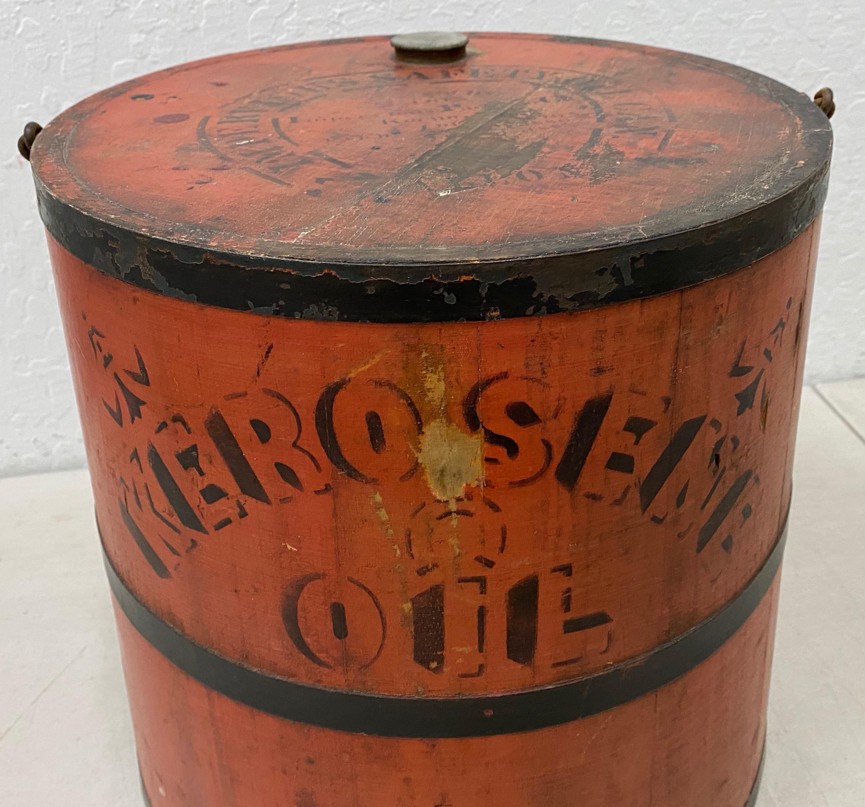 Early 20th century red stenciled kerosene oil can

Fantastic old school wooden and metal strap hand made kerosene oil can.

Though we don't use the cans today, kerosene lamps were in most every household in America in the 19th and early 20th
