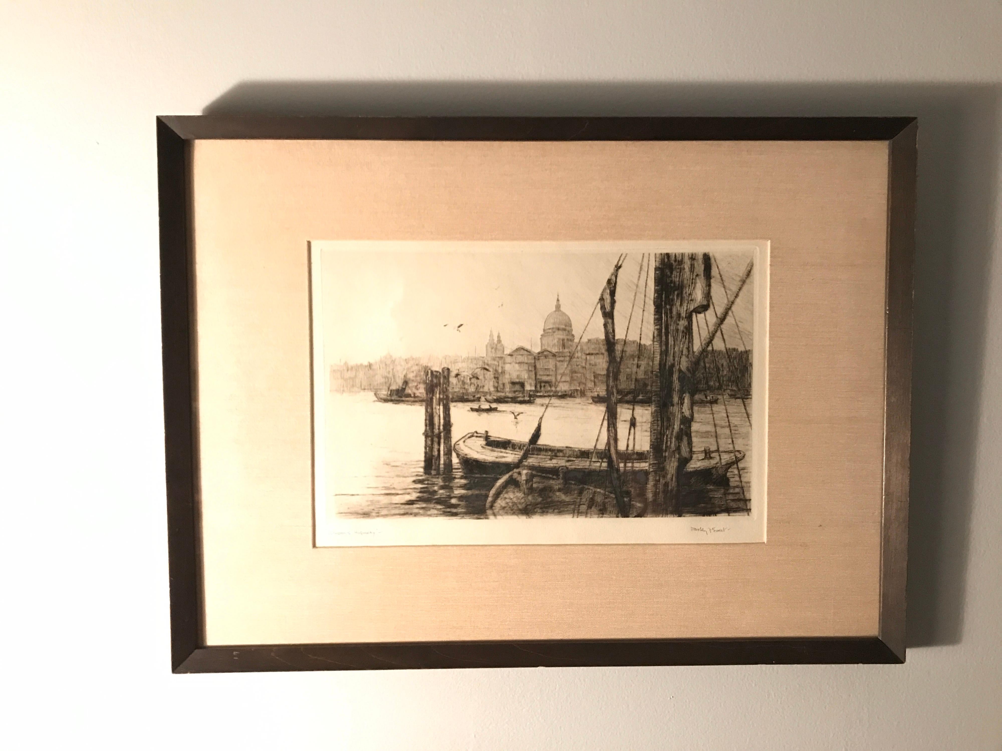 Early 20th C Signed Dorothy Sweet Etchings, “London’s Highway” and ”Tower of London” sold as a pair. Artwork on etching paper from the early 1900's, signed by artist on both pieces, matted and framed. 12”x 16” frames.