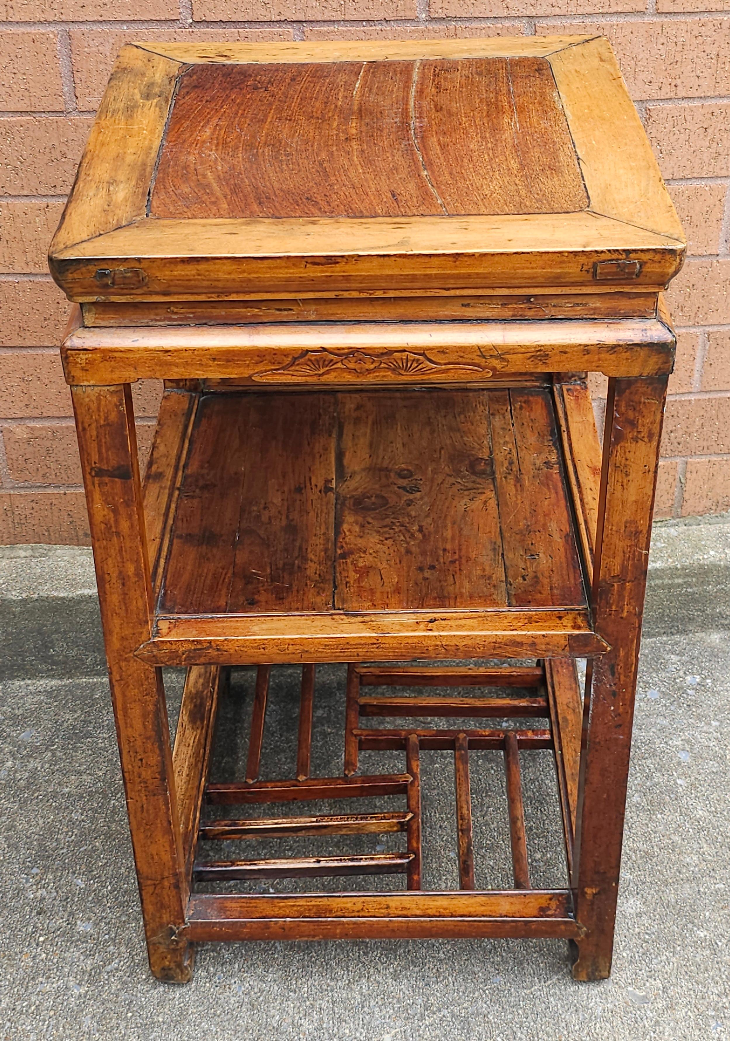 19th Centruy South East Asian, probably Chinese, Three-Tier Elmwood Side Table. Measures 15