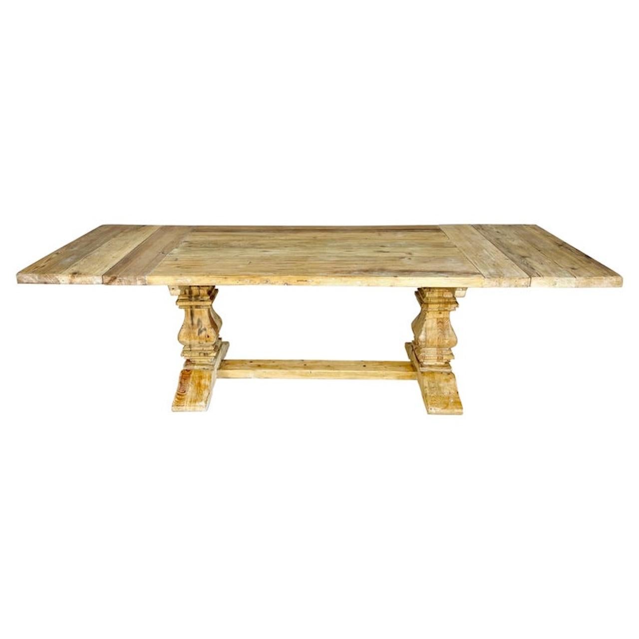 Italian Country pine table with two removable leaves. The table top stands on two pedestals and a bottom stretcher that connects the two sides. The table has a beautiful worn finish and is extremely sturdy.
Size without leaves: 72