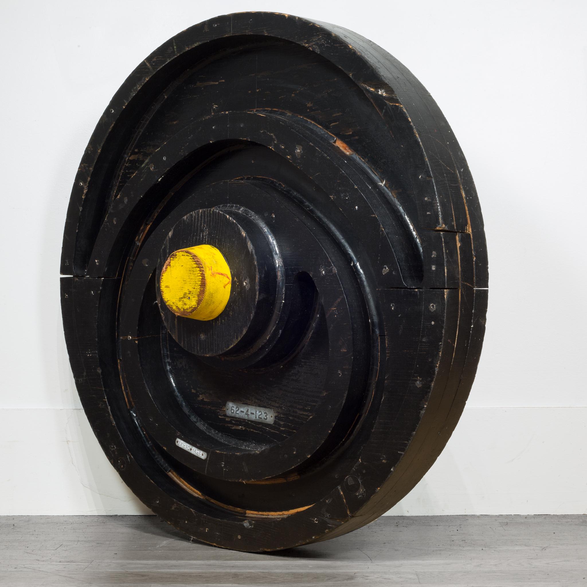 About

This is an original large wooden foundry mold used to make locomotive train wheels with metal identification tags. This piece has retained its original finish with minimal structural damage.

Creator: Unknown.
Date of manufacture circa