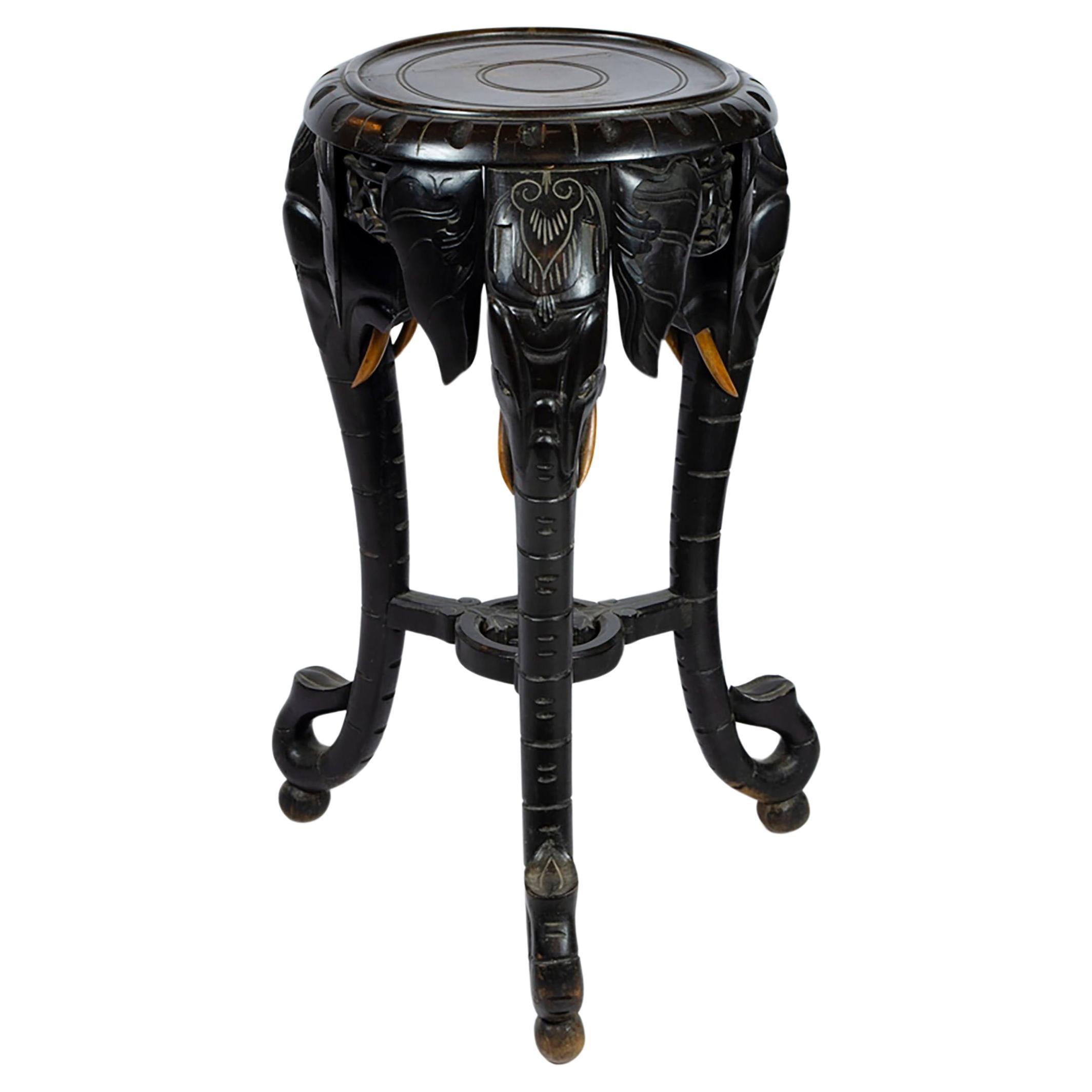 Early 20th Carved Ebonised Elephant heads/trunks Console Table For Sale