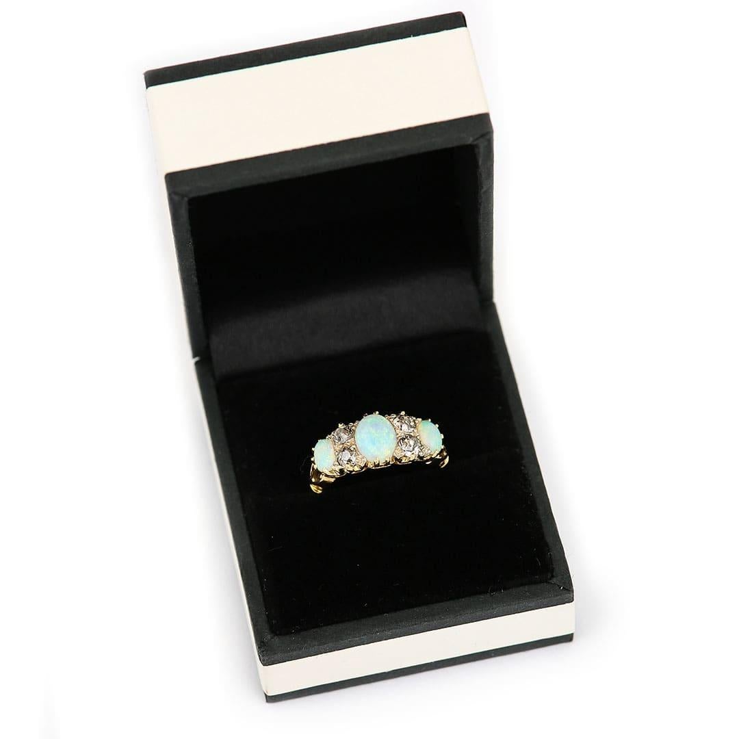 Early 20th Century 18ct Gold, Opal and Diamond Three Stone Ring, Circa 1910 4