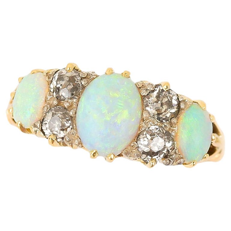 Early 20th Century 18ct Gold, Opal and Diamond Three Stone Ring, Circa ...