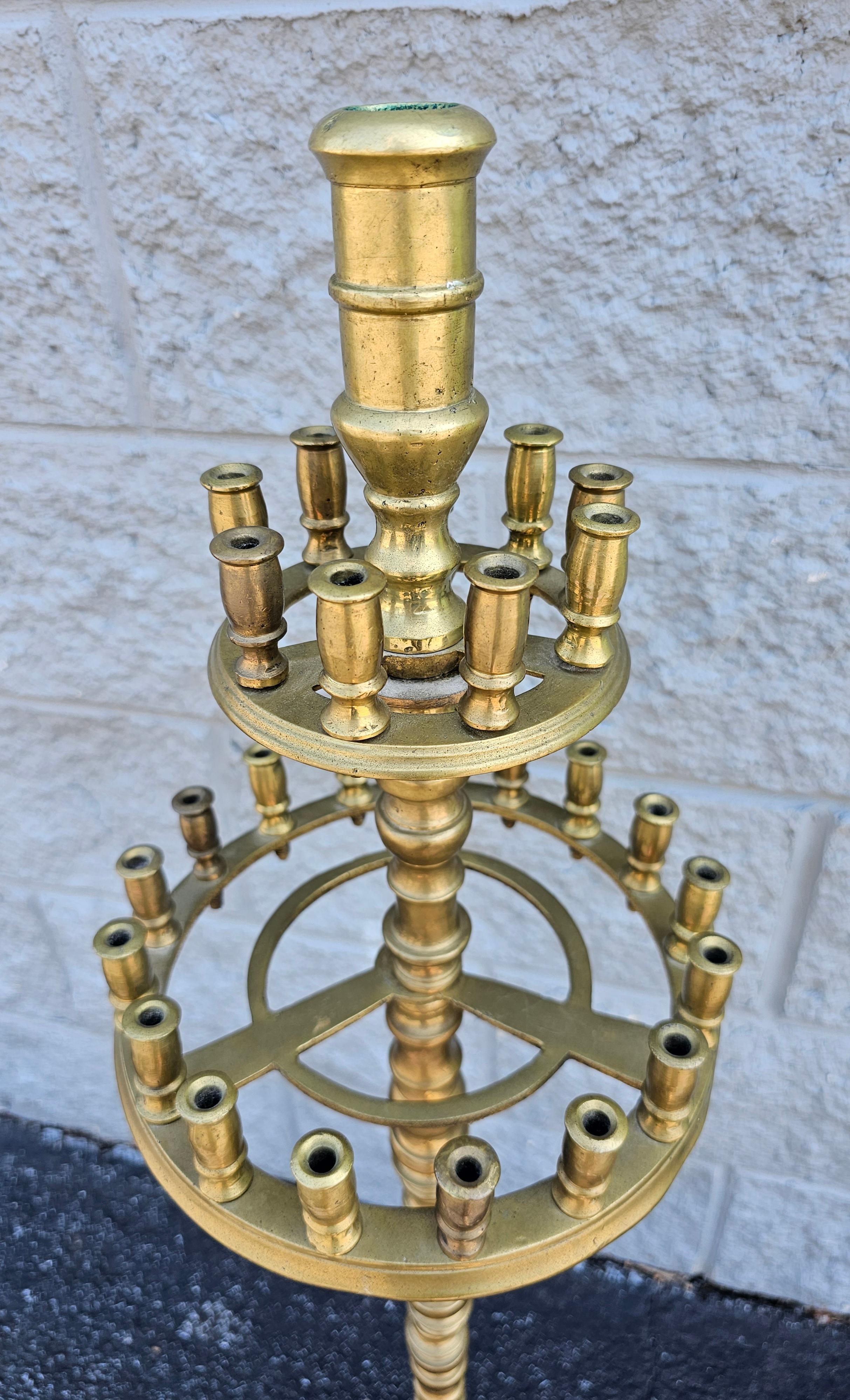 An exceptional Early 20th Century two tier 27 Light Gothic Cast Brass Floor CandleStick Torchere. 
Measures 9.5