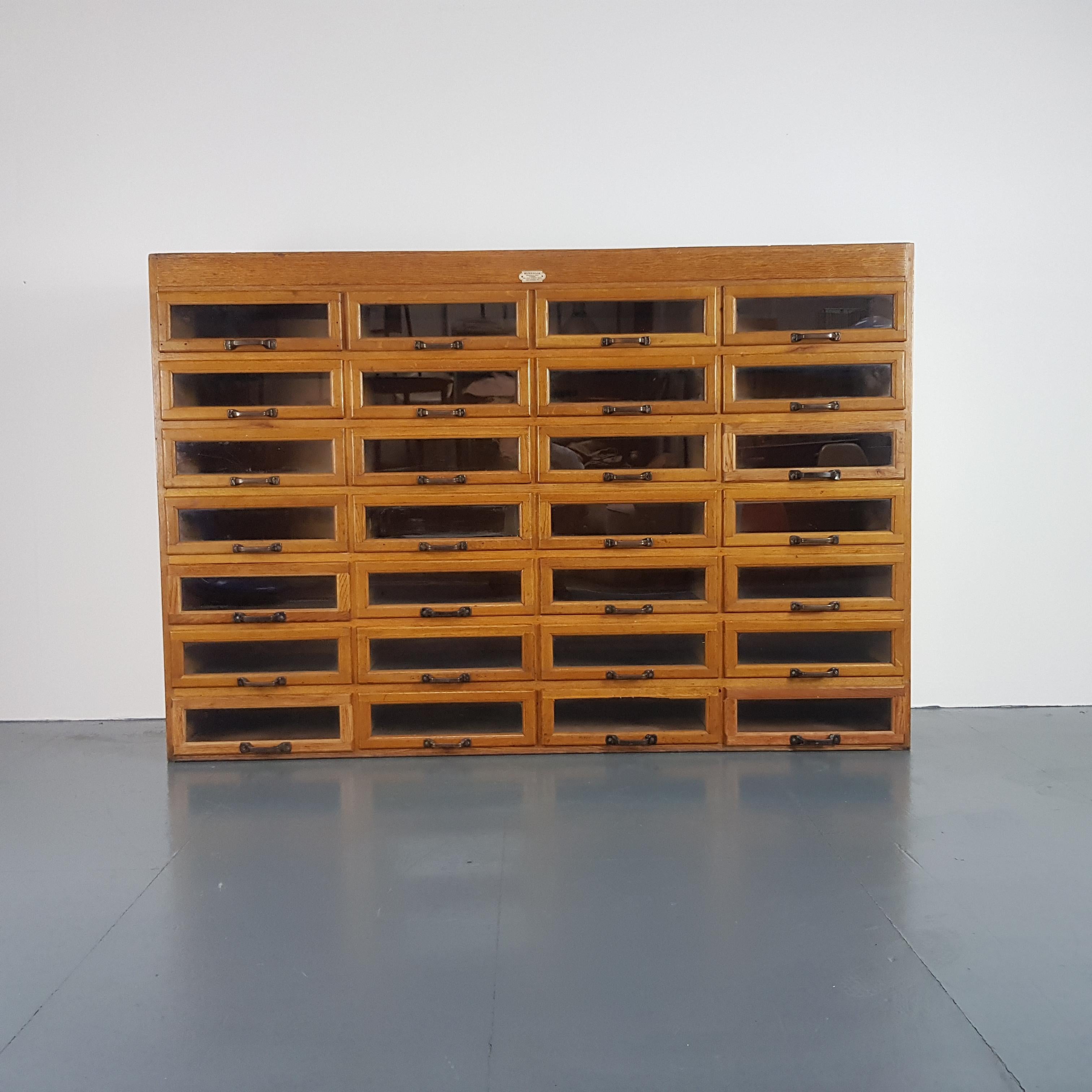 Early 20th century haberdashery cabinet.

Fantastic 28-drawer haberdashery chest.

In good vintage condition.  Some scuffs here and there commensurate with age.  Please bear in mind this has come from a working shop and is from the middle of the