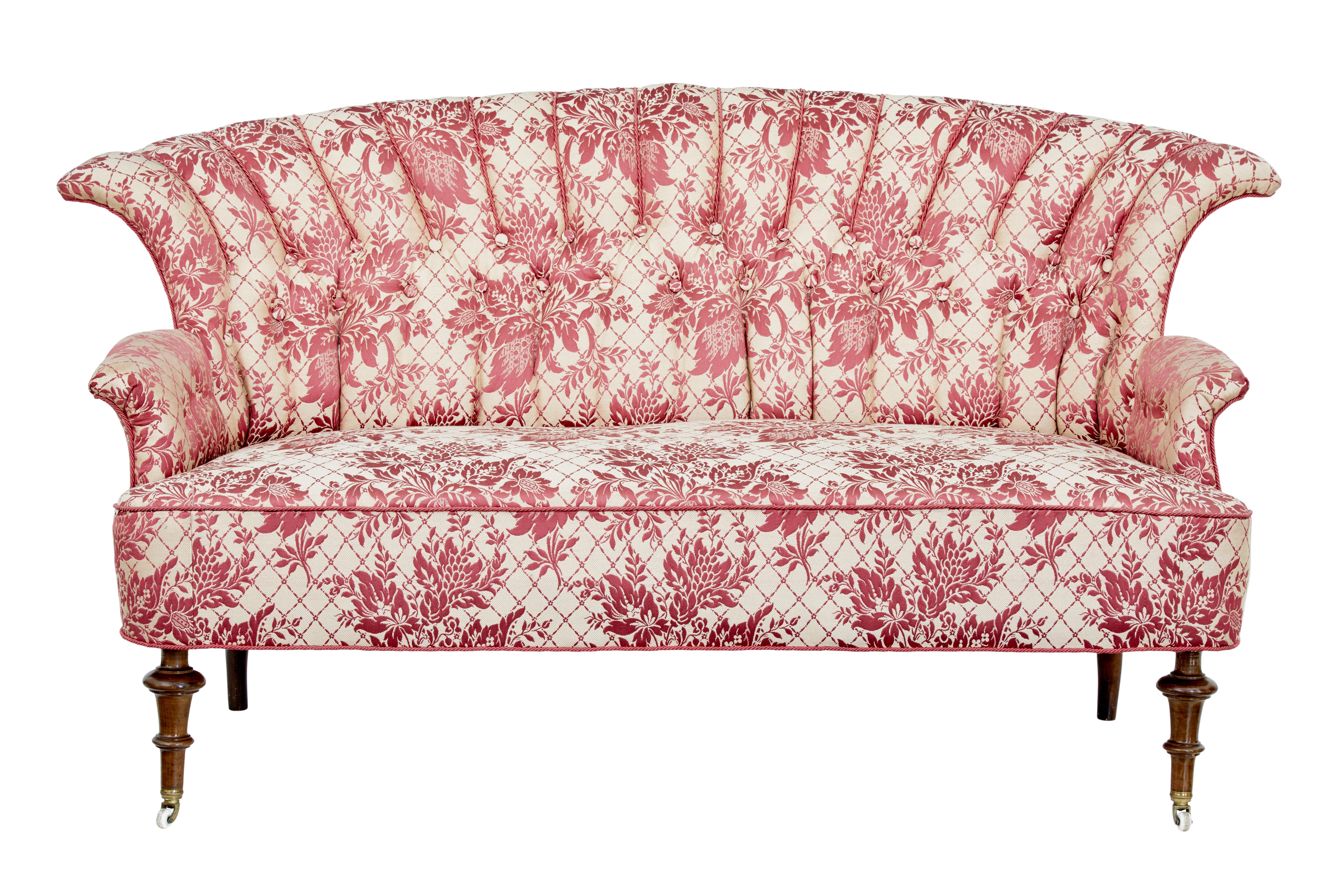 Striking 3-piece salon suite, circa 1900.

Suite comprises of a sofa and 2 matching chairs. Each with fan shell backs, piping and buttonback detail. Richly upholstered in cream material with red silk woven pattern. Wire back