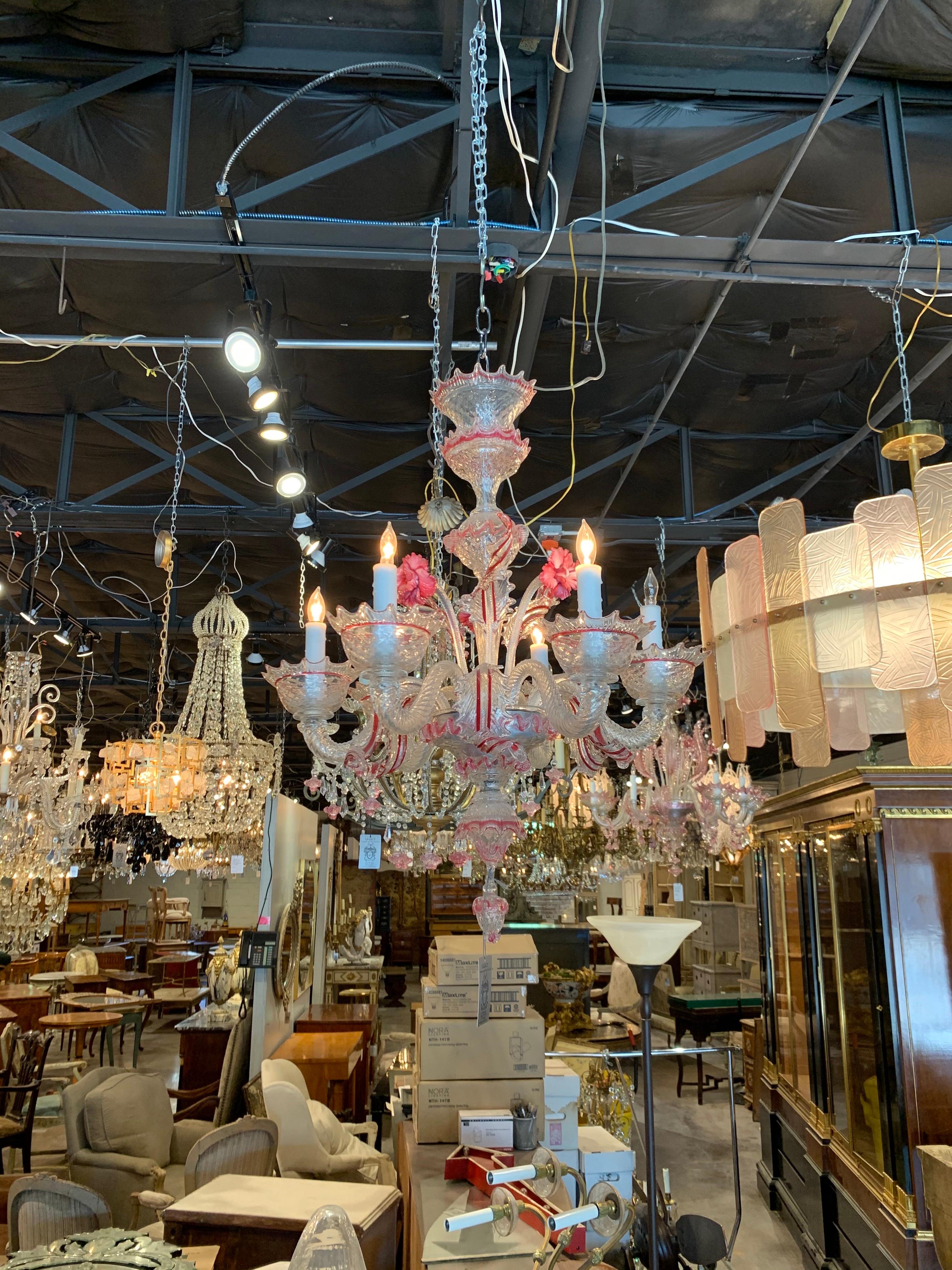 Lovely early 20th century 6-light Venetian chandelier. The fixture has pretty pink details along with beautiful pink and white flowers. A fabulous decorative piece!