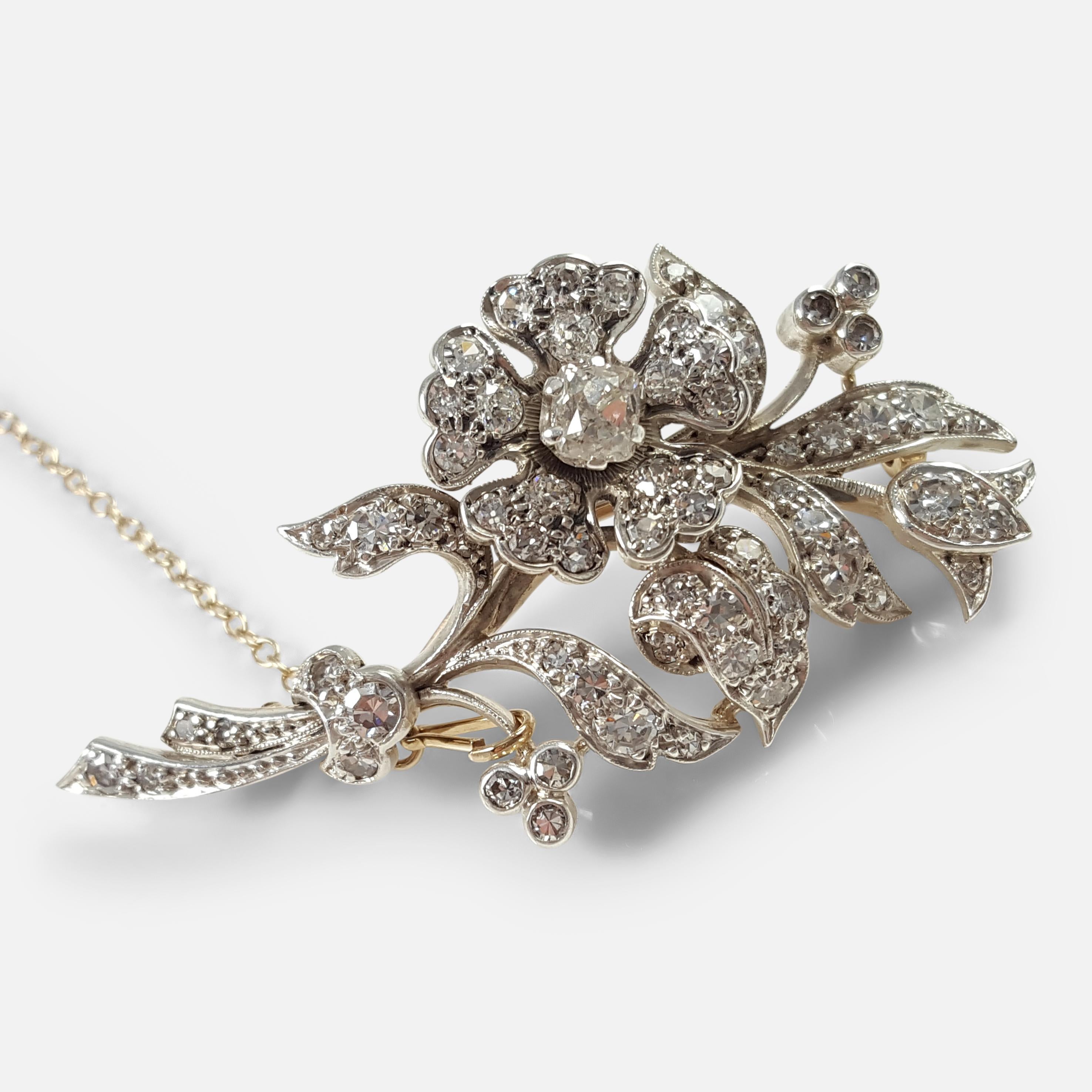 An early 20th century diamond floral brooch, circa 1900s. The brooch has been beautifully crafted to include 66 mixed cut diamonds with a total diamond weight of approximately 2.36cts set into the brooch. As was common for the period the brooch is