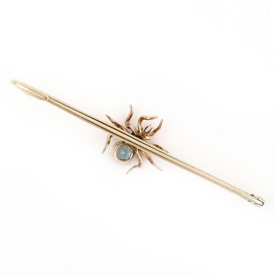 Round Cut Early 20th Century 9 Carat Gold Sapphire and Topaz Spider Bar Brooch