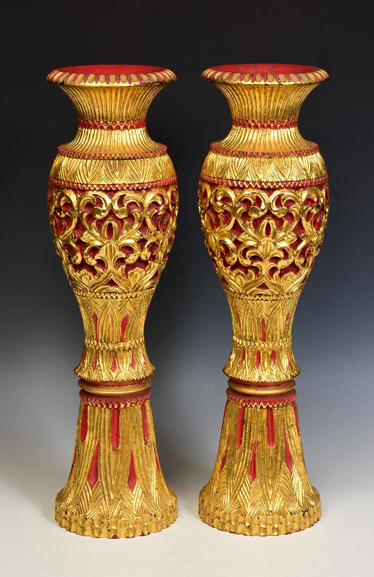 A pair of Burmese lacquered vase with gilding.

Age: Burma, Early 20th Century
Size: Height 51.8 C.M. / Width 14.3 C.M.
Condition: Nice condition overall (some expected degradation due to their age). 

100% Satisfaction and authenticity
