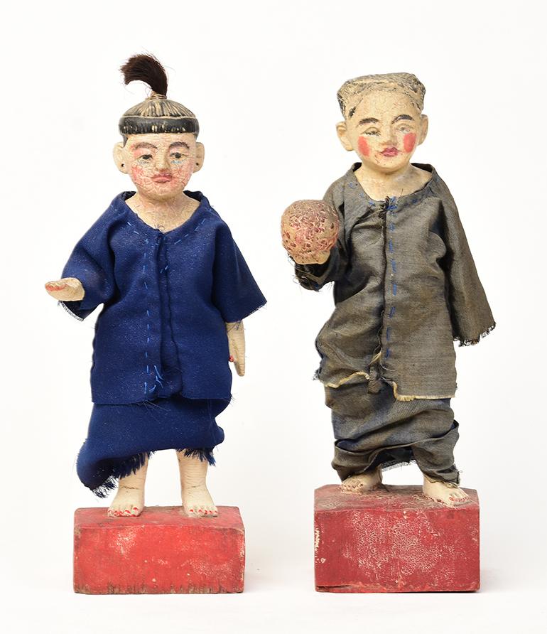 A pair of Burmese wooden male and female figurines.

Age: Burma, early 20th century
Size: Height 31 - 32.4 C.M. / Width 10.1 - 10.4 C.M.
Condition: Nice condition overall (some expected degradation due to their age).