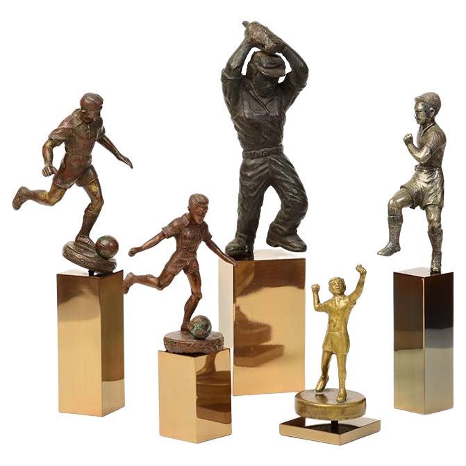 Early 20th Century, A Set of Burmese Bronze Sportsman Figurines For Sale