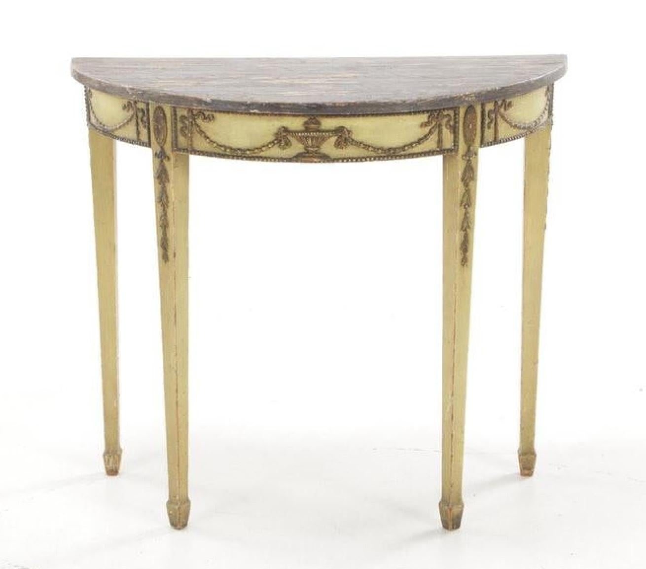 A beautiful painted Adam-style demilune console table with urn & swag details

Circa early 20th century

Measures: 36