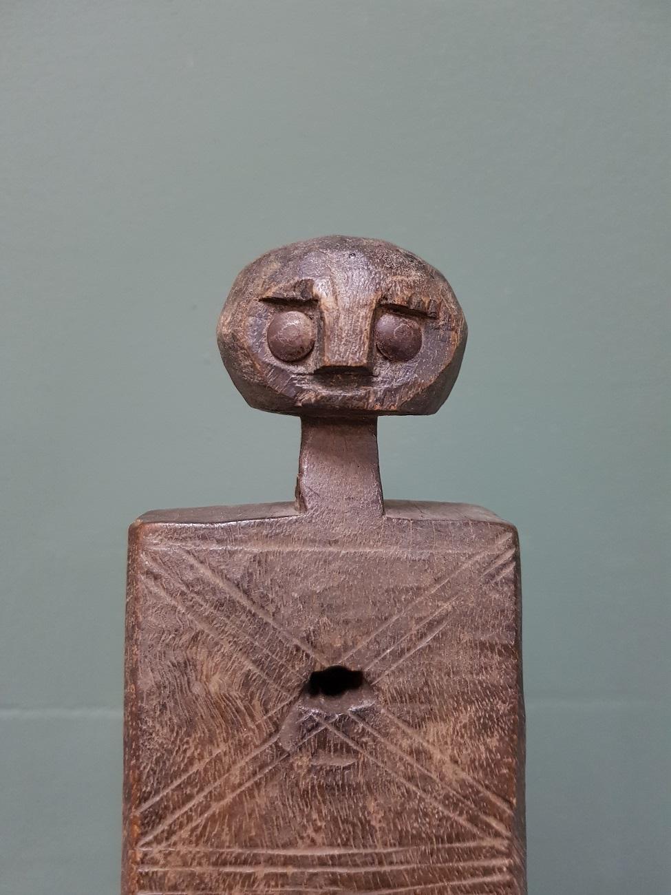 African carved figurative door lock of the Dogon or Bambara Tribe Mali and in good condition with a beautiful patina, first half of the 20th century.

The measurements are:
Depth 7 cm/ 2.7 inch.
Width 10 cm/ 3.9 inch.
Height 31 cm/ 12.2 inch.