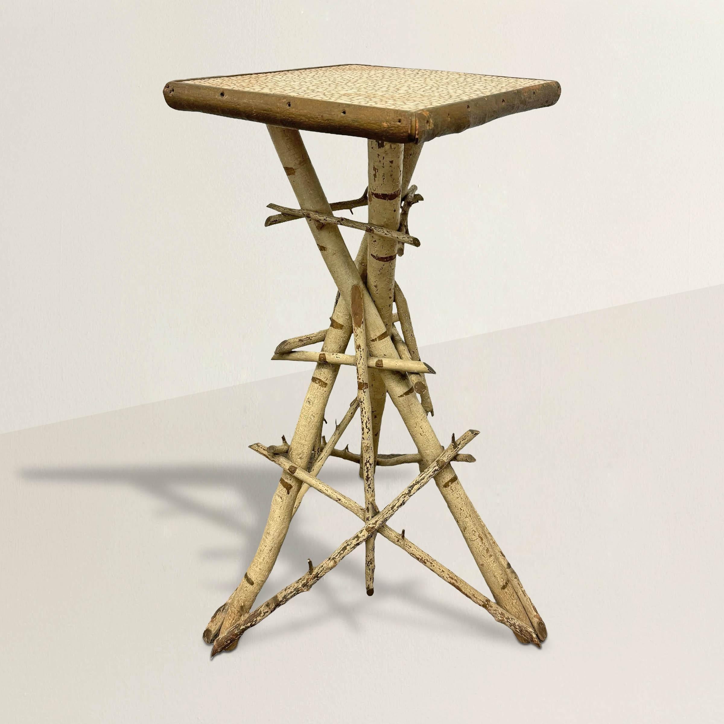 Embrace the rustic charm of early 20th-century American Adirondack design with this exquisite side table, expertly crafted from beech branches and artfully painted white to emulate the iconic birch. The base, formed from three large branches