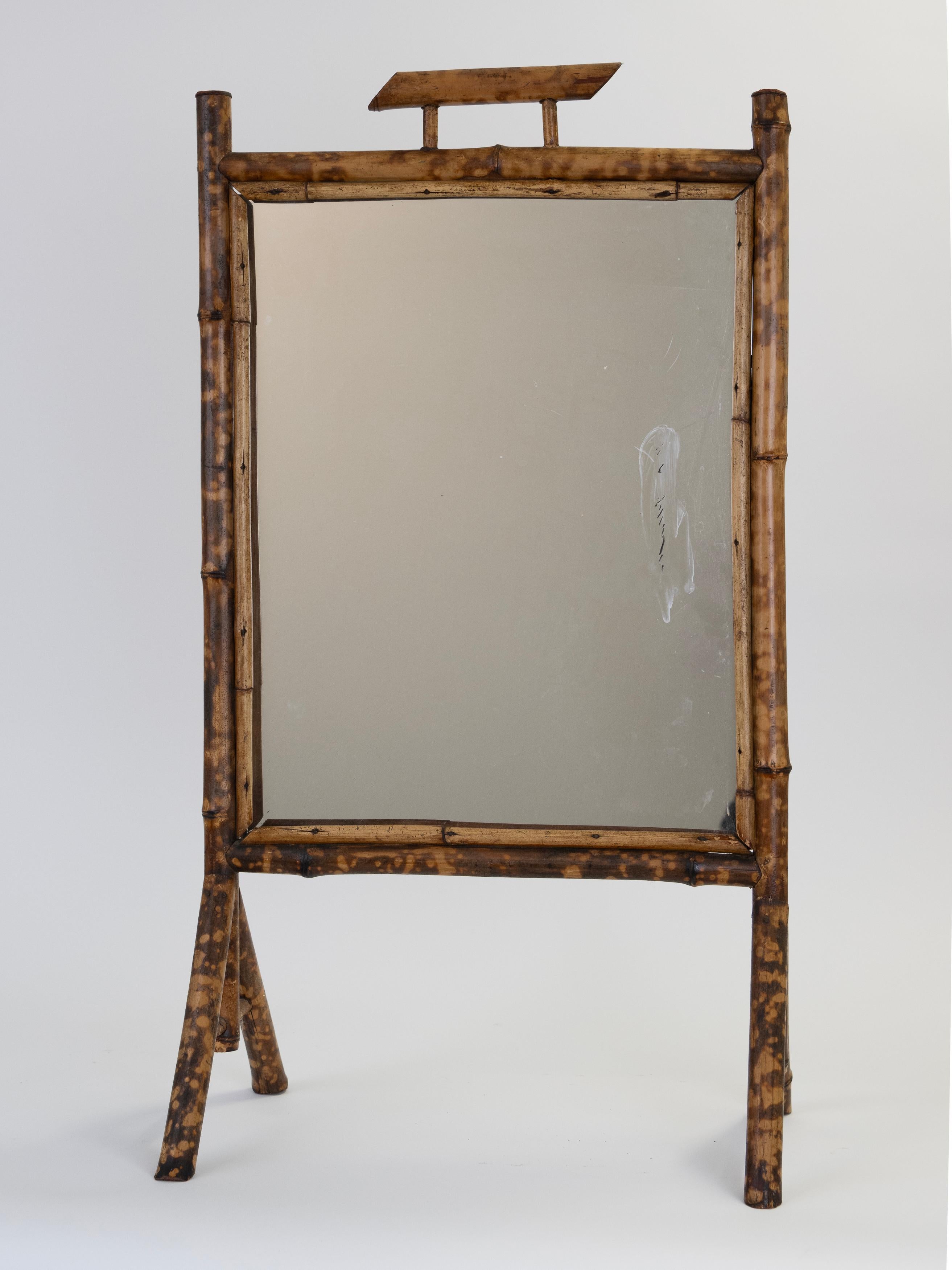 Standing American Bamboo Mirror is structurally stable although has a small crack on one leg. 
Beautiful patina 