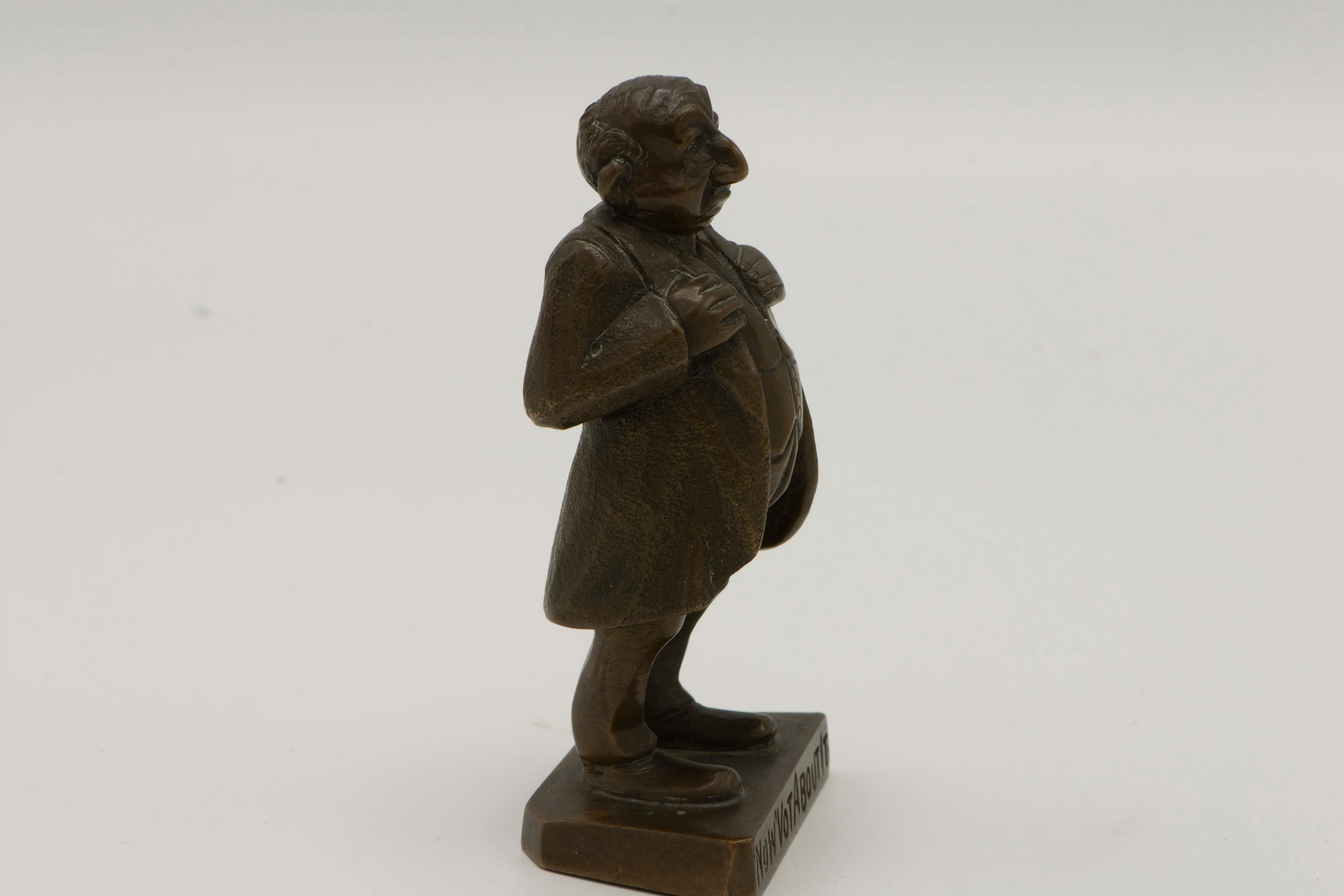 Bronze figurine of a self-satisfied, disapproving Jewish businessman with the caption: Now! Vot about it? (an imitation of the Jewish accent), heavy, cast bronze figurine of a rotund bald man in a 3 piece suit. He stands, slightly bow legged, with