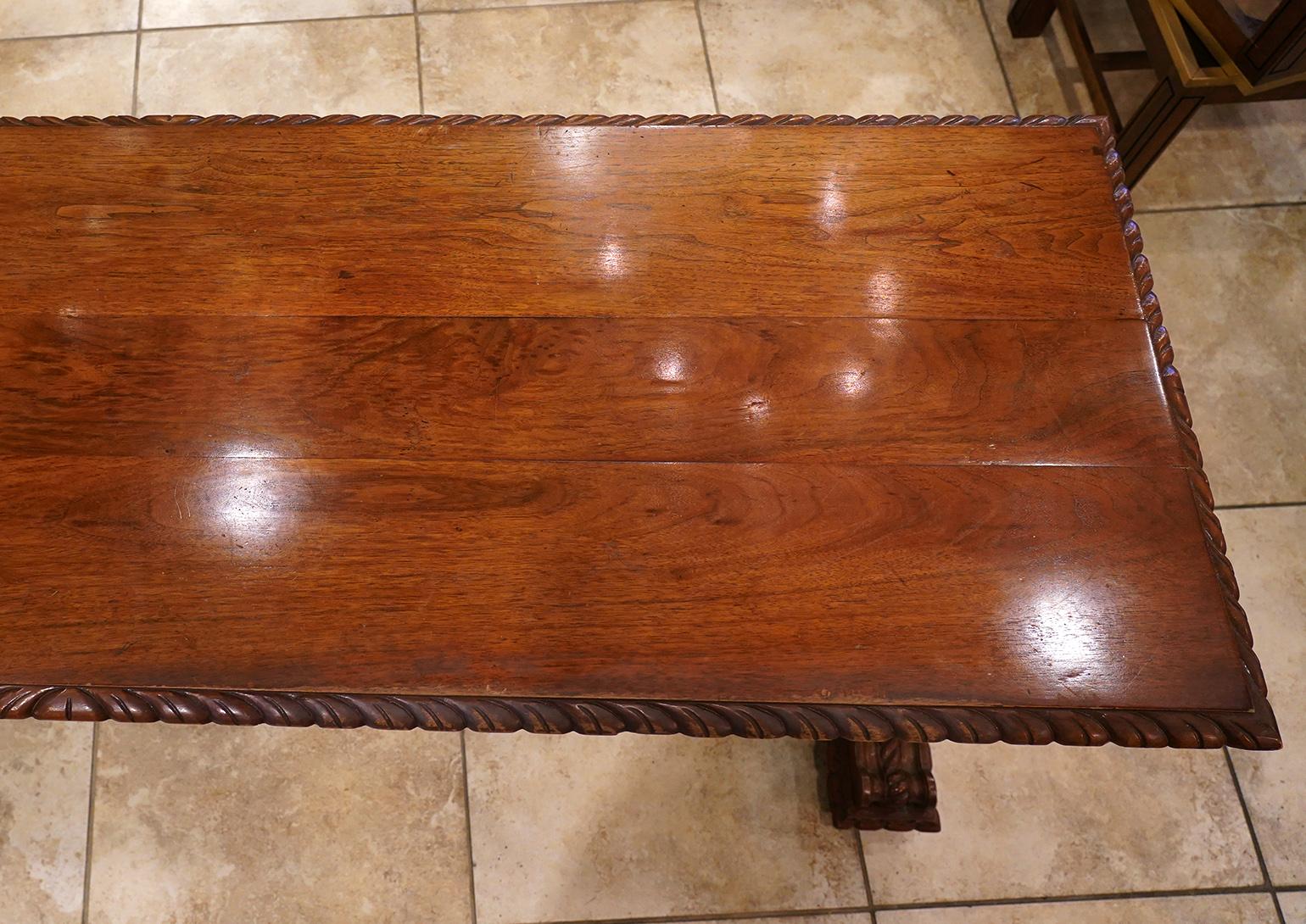 Early 20th Century American Carved Walnut Threstle Base Library or Center Table 1