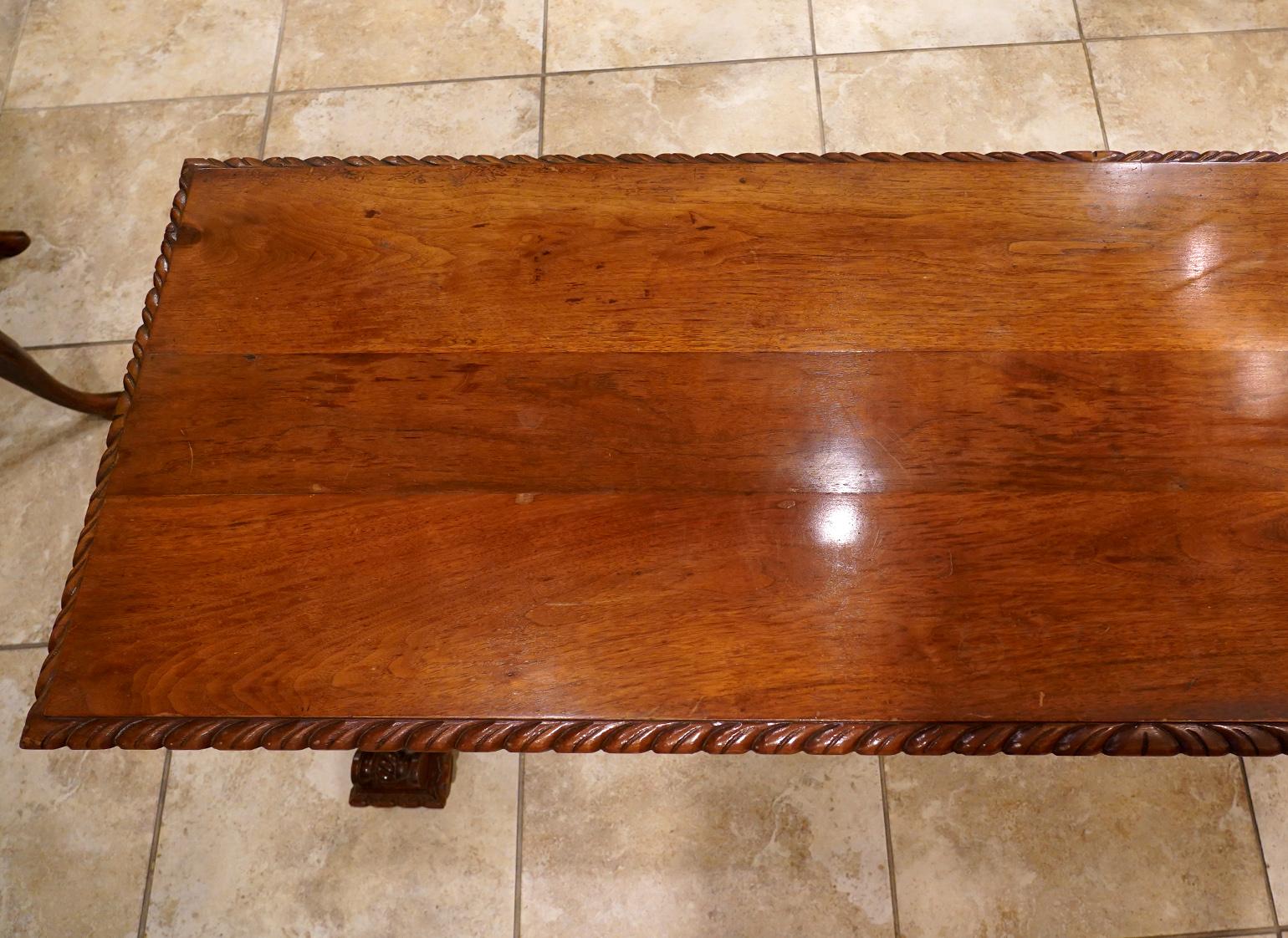 Early 20th Century American Carved Walnut Threstle Base Library or Center Table 2